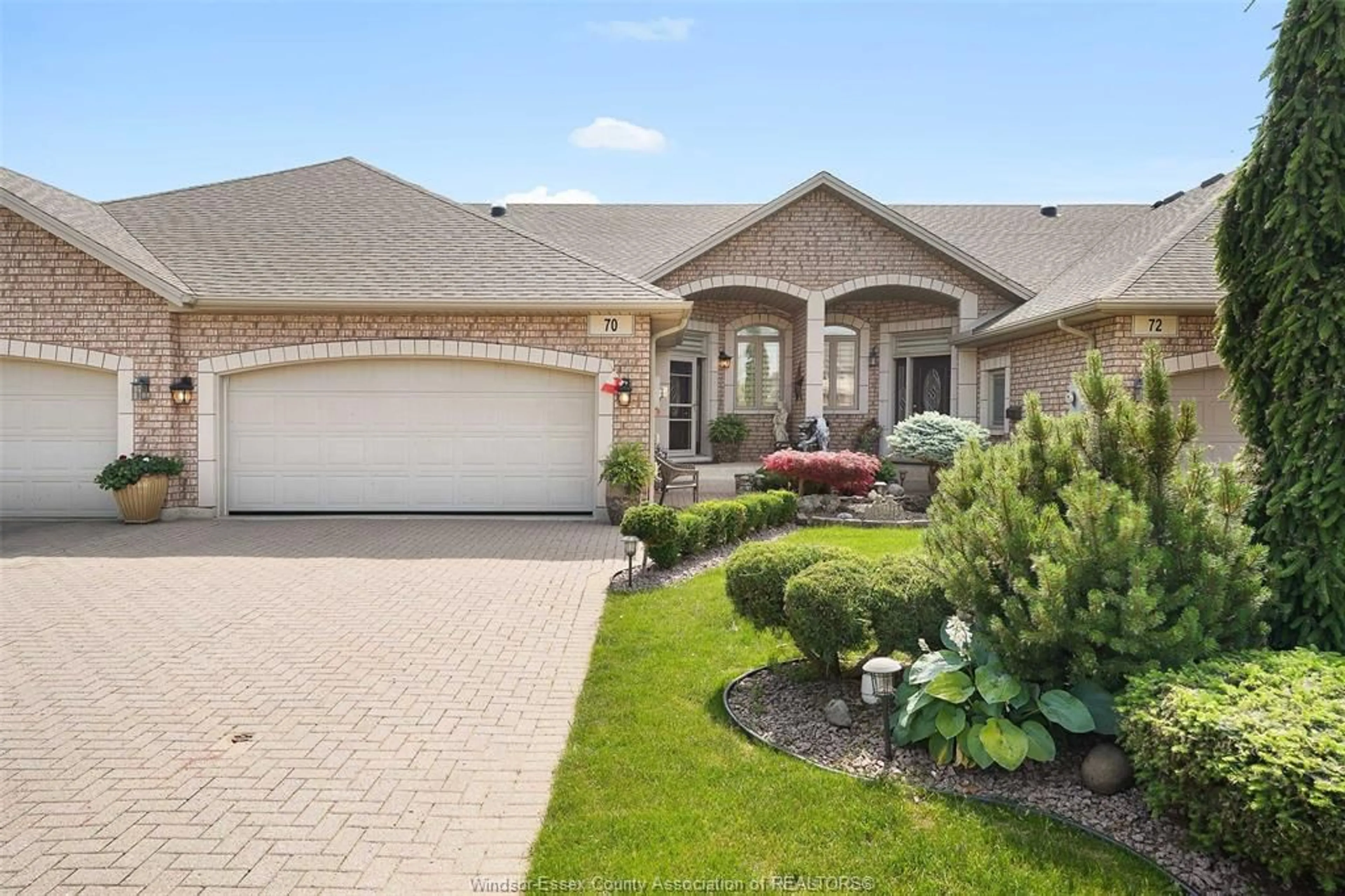 Home with brick exterior material, street for 70 CAROLINA WOODS, Leamington Ontario N8H 5N3