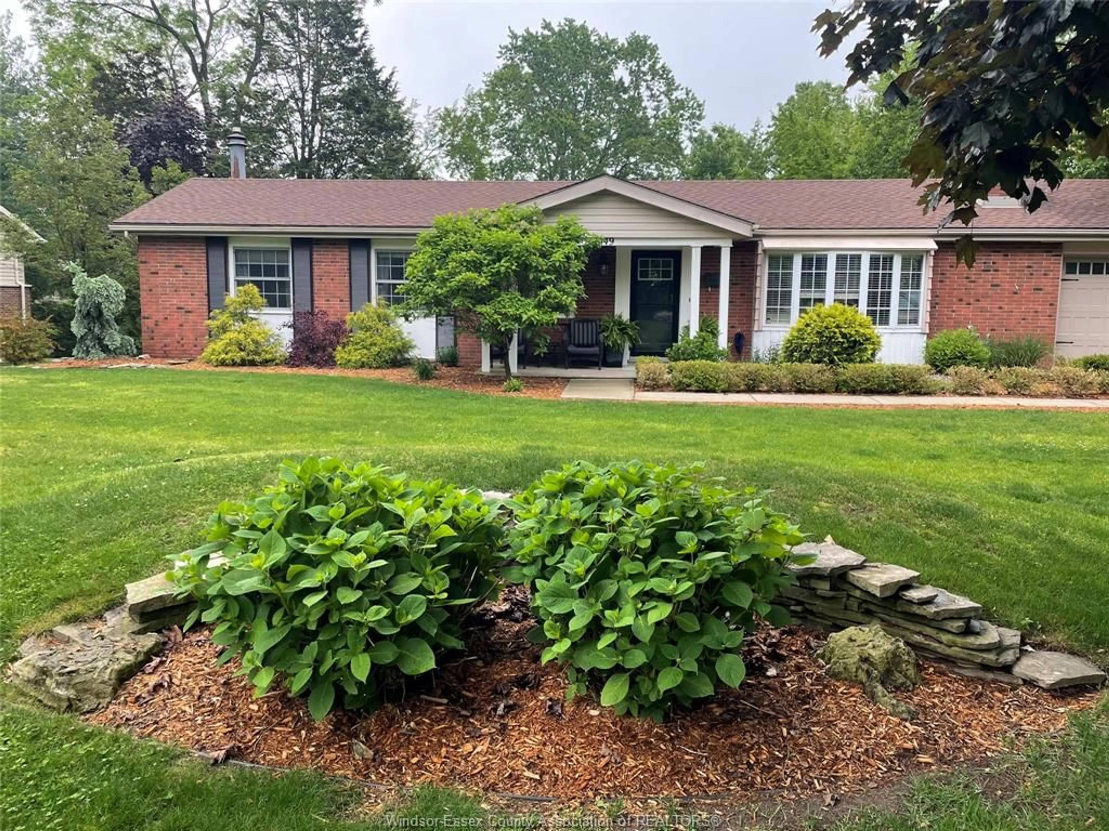 Home with brick exterior material, street for 3049 ROWLEY PARK Dr, Kingsville Ontario N9Y 2Y2
