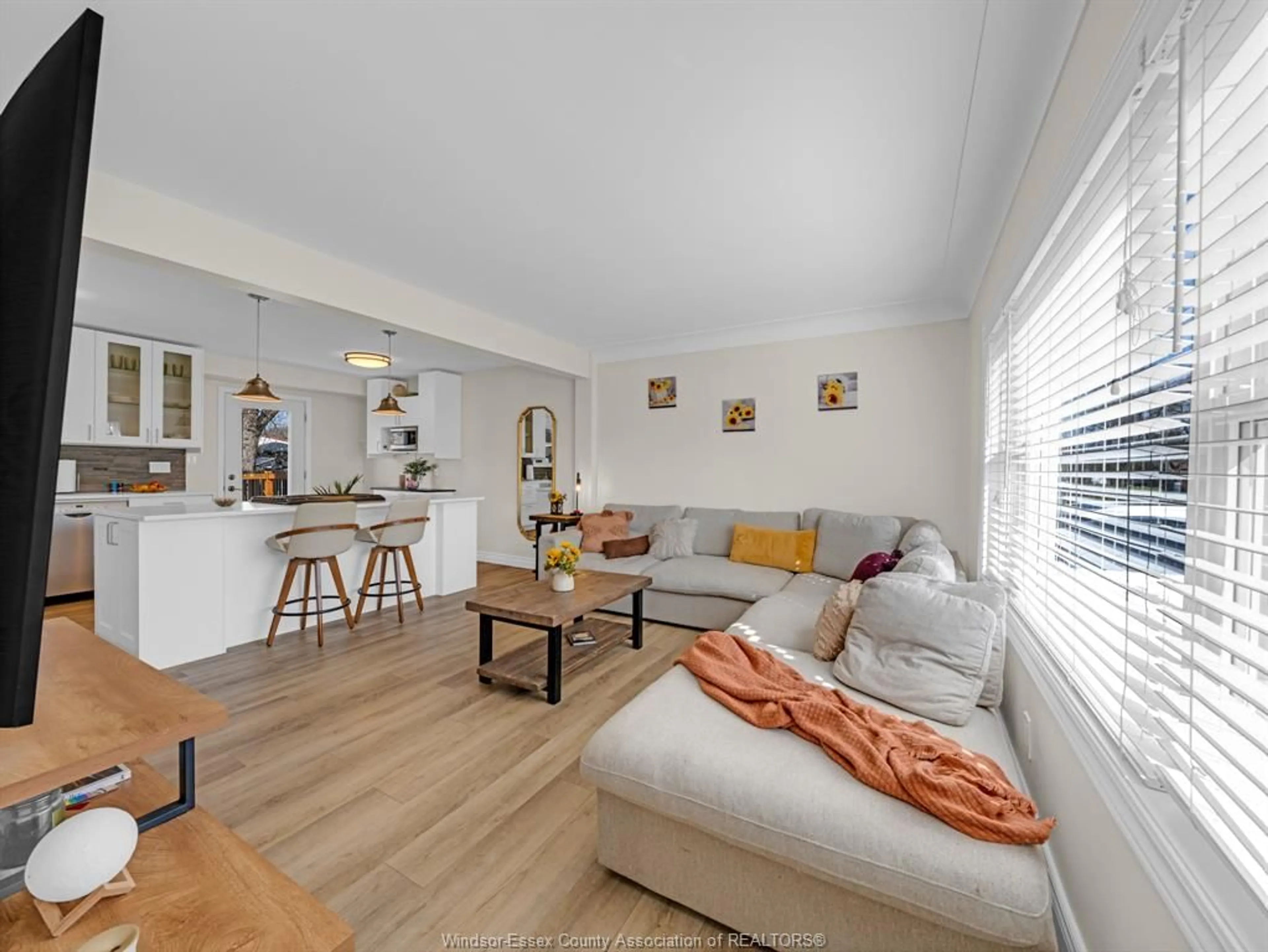 Living room with furniture, wood/laminate floor for 1131 FAIRVIEW BLVD., Windsor Ontario N8S 3E3