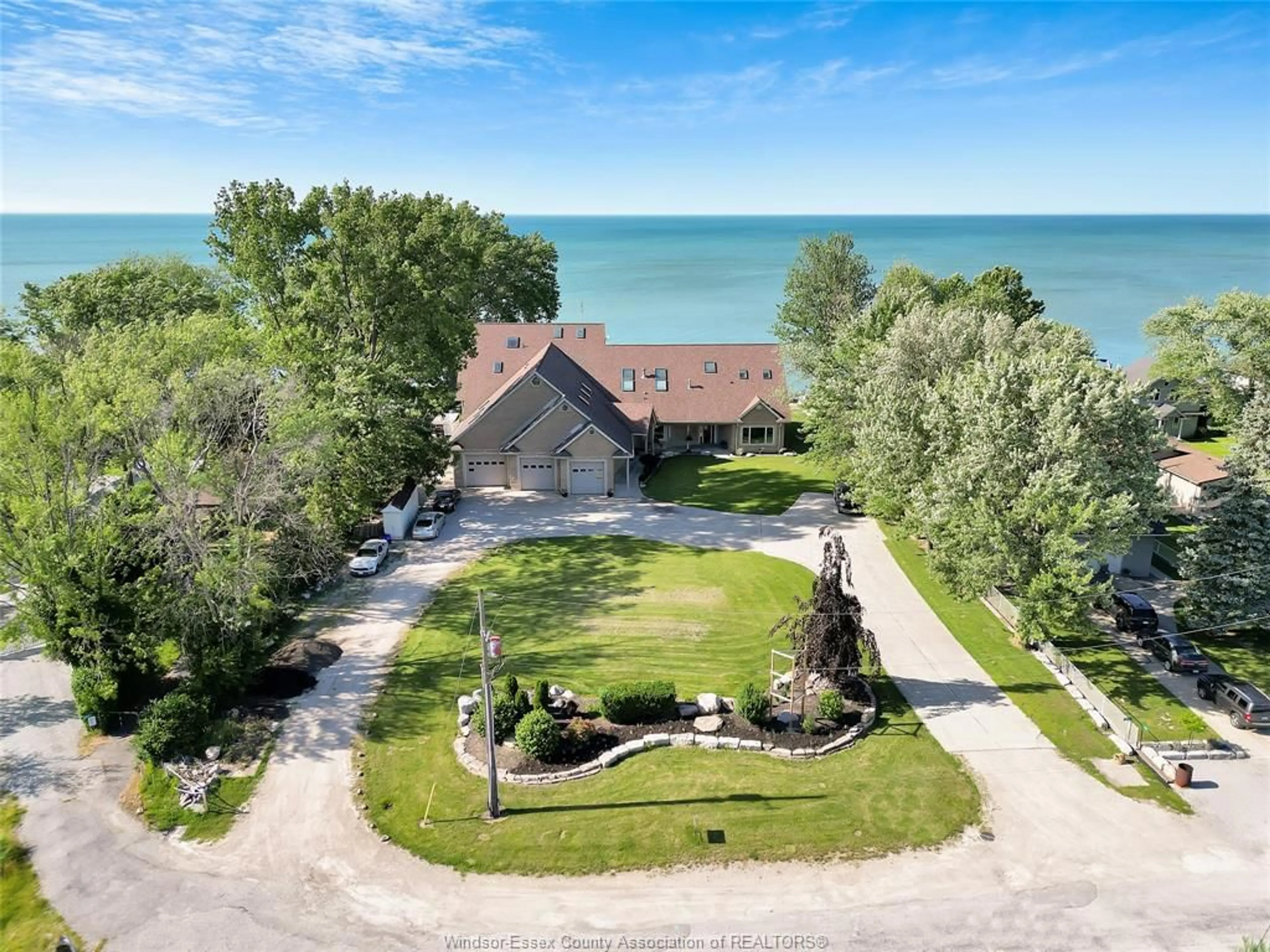 A pic from outside/outdoor area/front of a property/back of a property/a pic from drone, water/lake/river/ocean view for 331 CHARRON BEACH, Belle River Ontario N0R 1A0