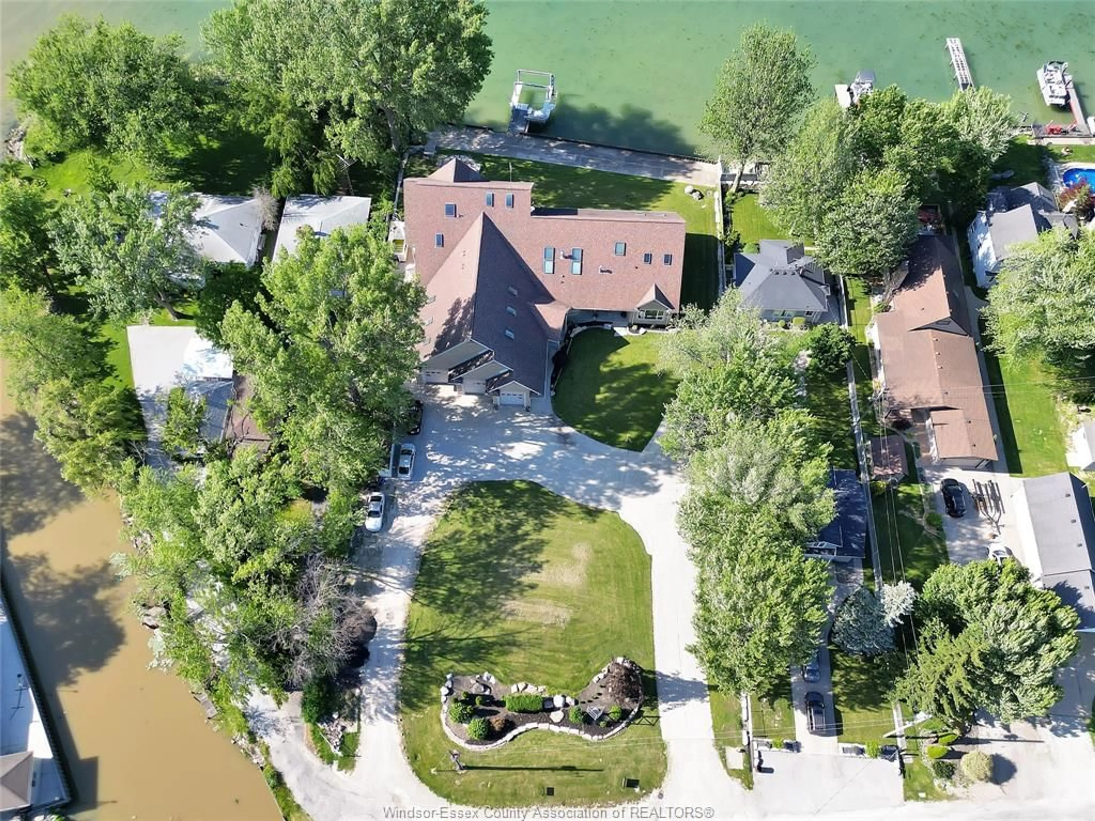 A pic from outside/outdoor area/front of a property/back of a property/a pic from drone, water/lake/river/ocean view for 331 CHARRON BEACH, Belle River Ontario N0R 1A0