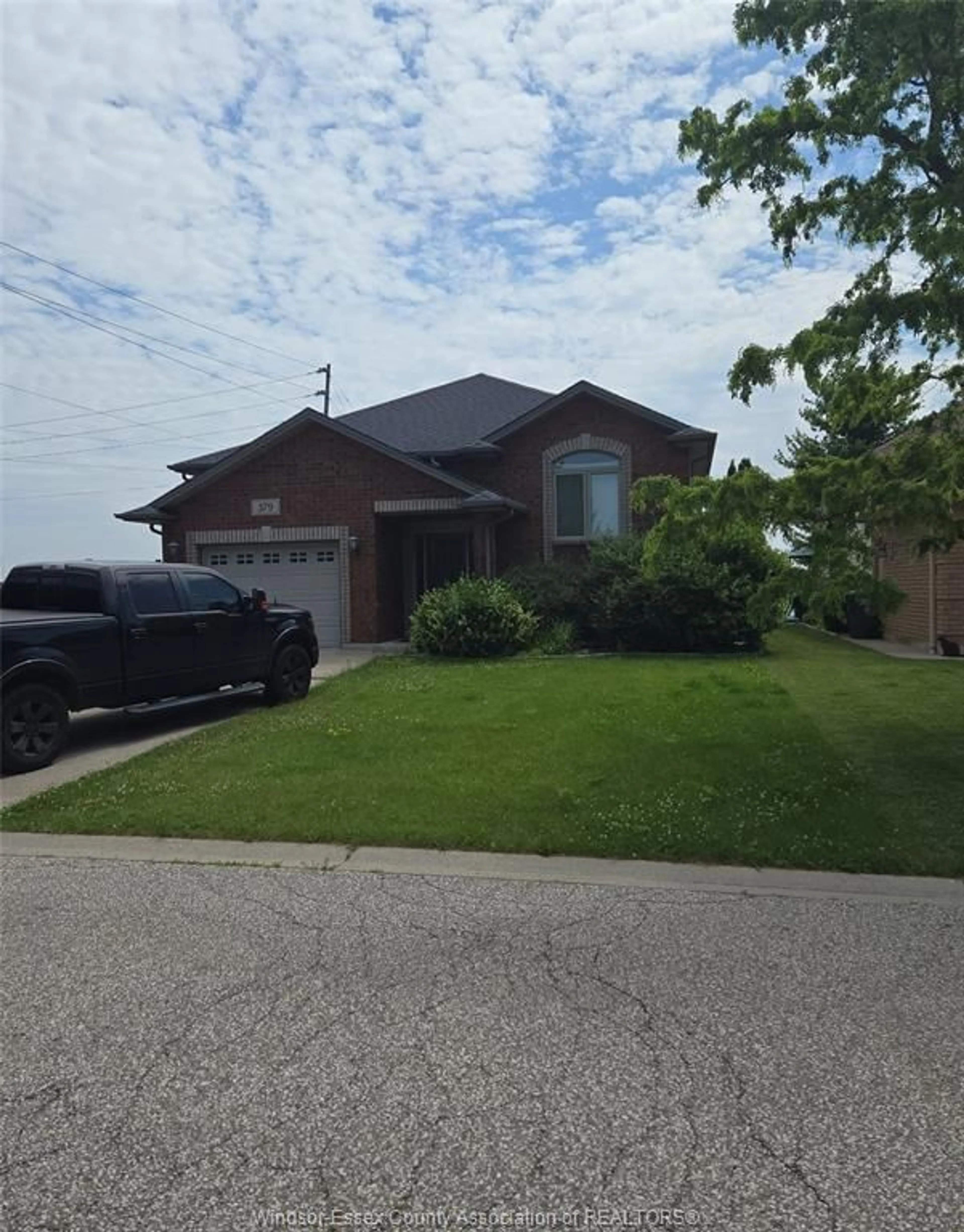 Home with brick exterior material, street for 379 SELLICK Dr, Harrow Ontario N0R 1G0