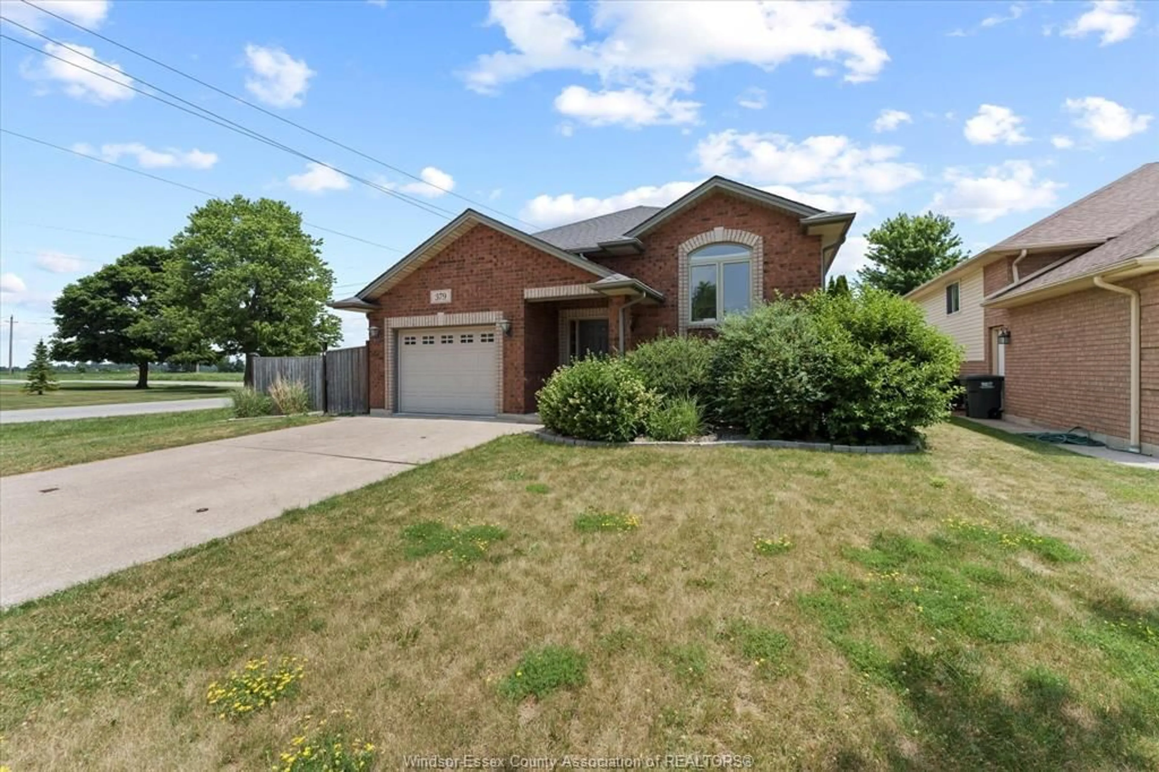 Home with brick exterior material, street for 379 SELLICK Dr, Harrow Ontario N0R 1G0