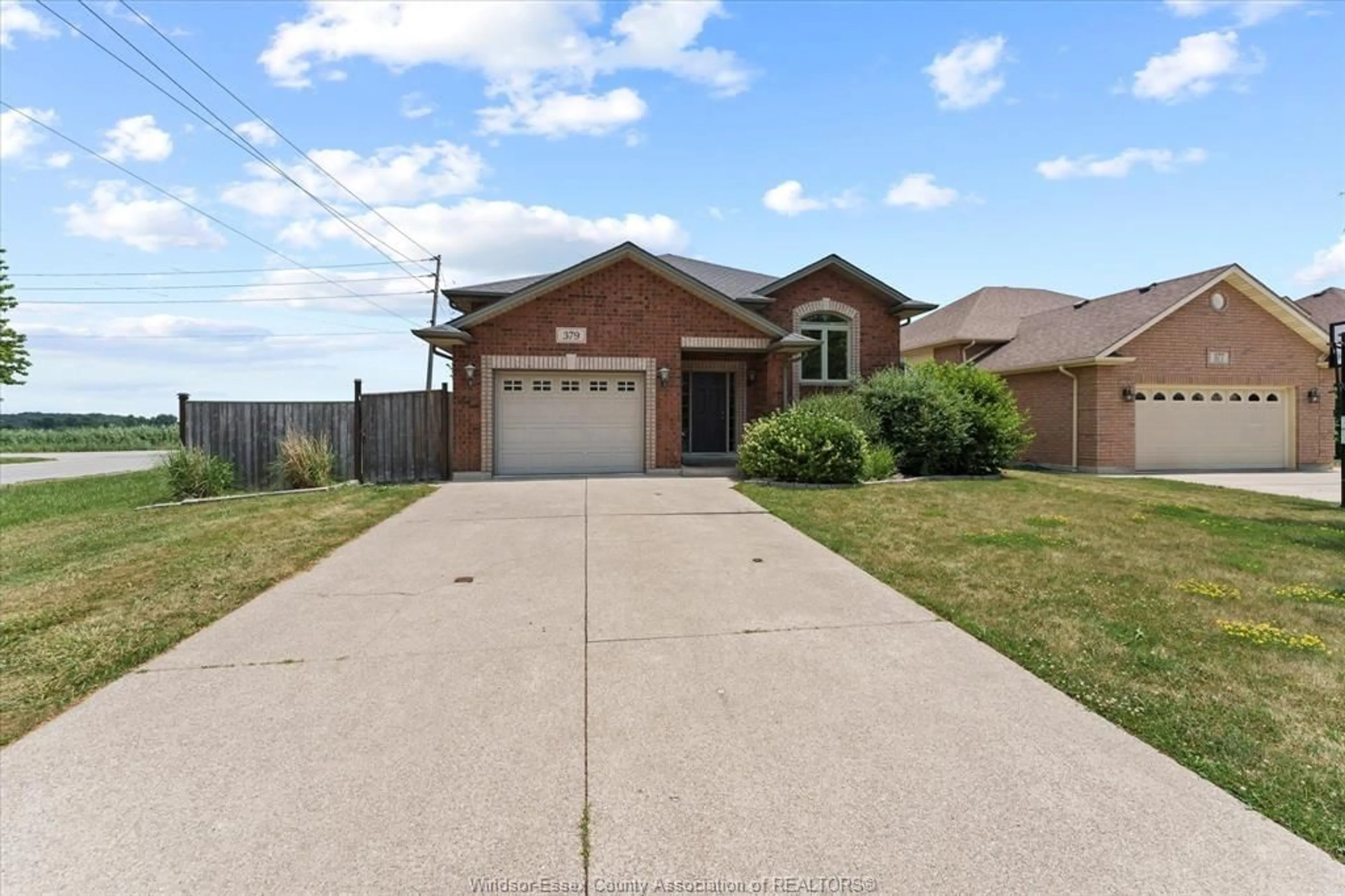 Home with brick exterior material, street for 379 SELLICK Dr, Harrow Ontario N0R 1G0