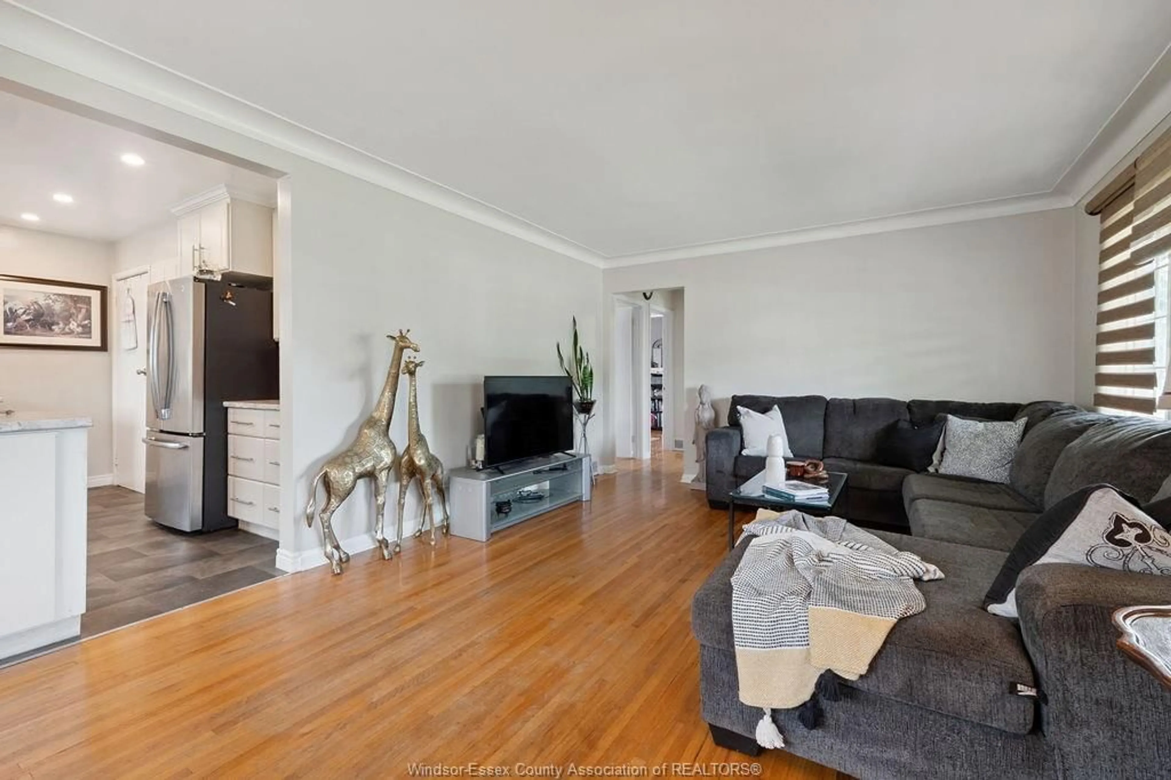 Living room with furniture, wood/laminate floor for 1178 JEFFERSON Blvd, Windsor Ontario N8S 2R4