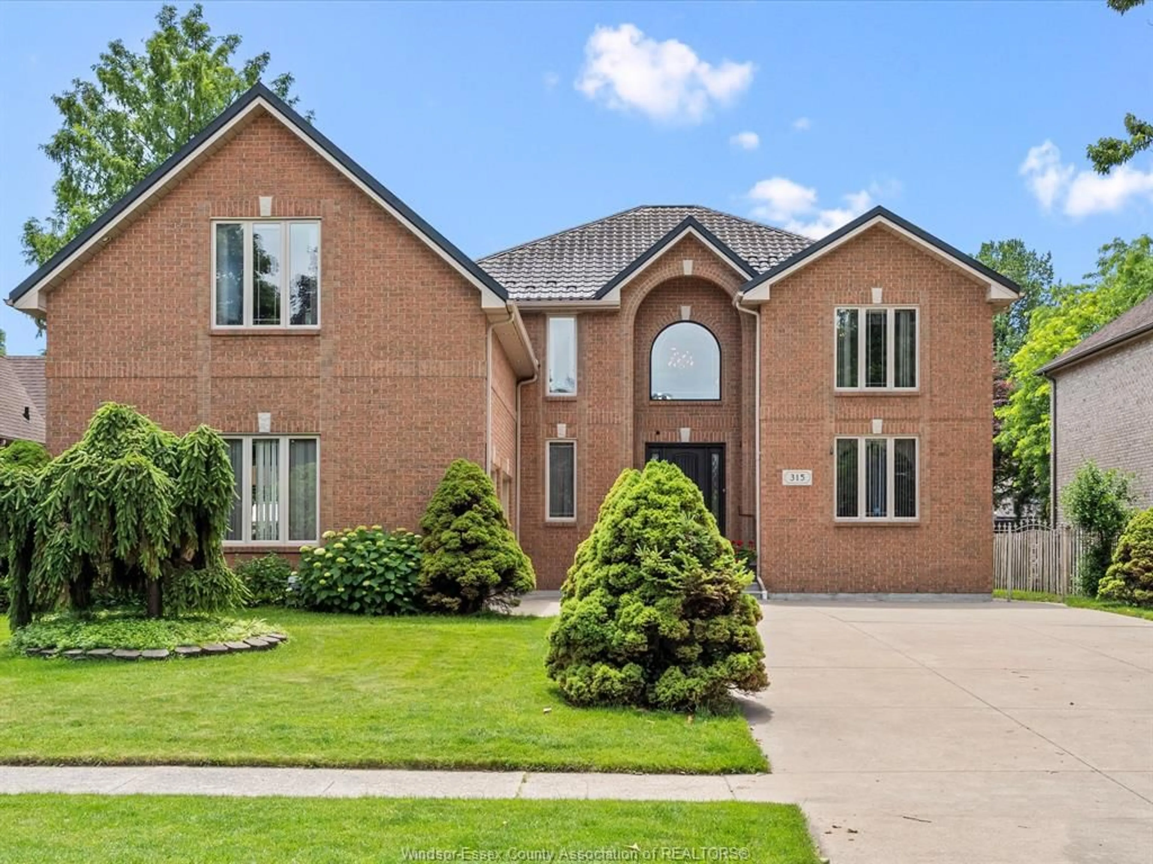 Home with brick exterior material, street for 315 MAJESTIC DRIVE, Lakeshore Ontario N8N 4K9