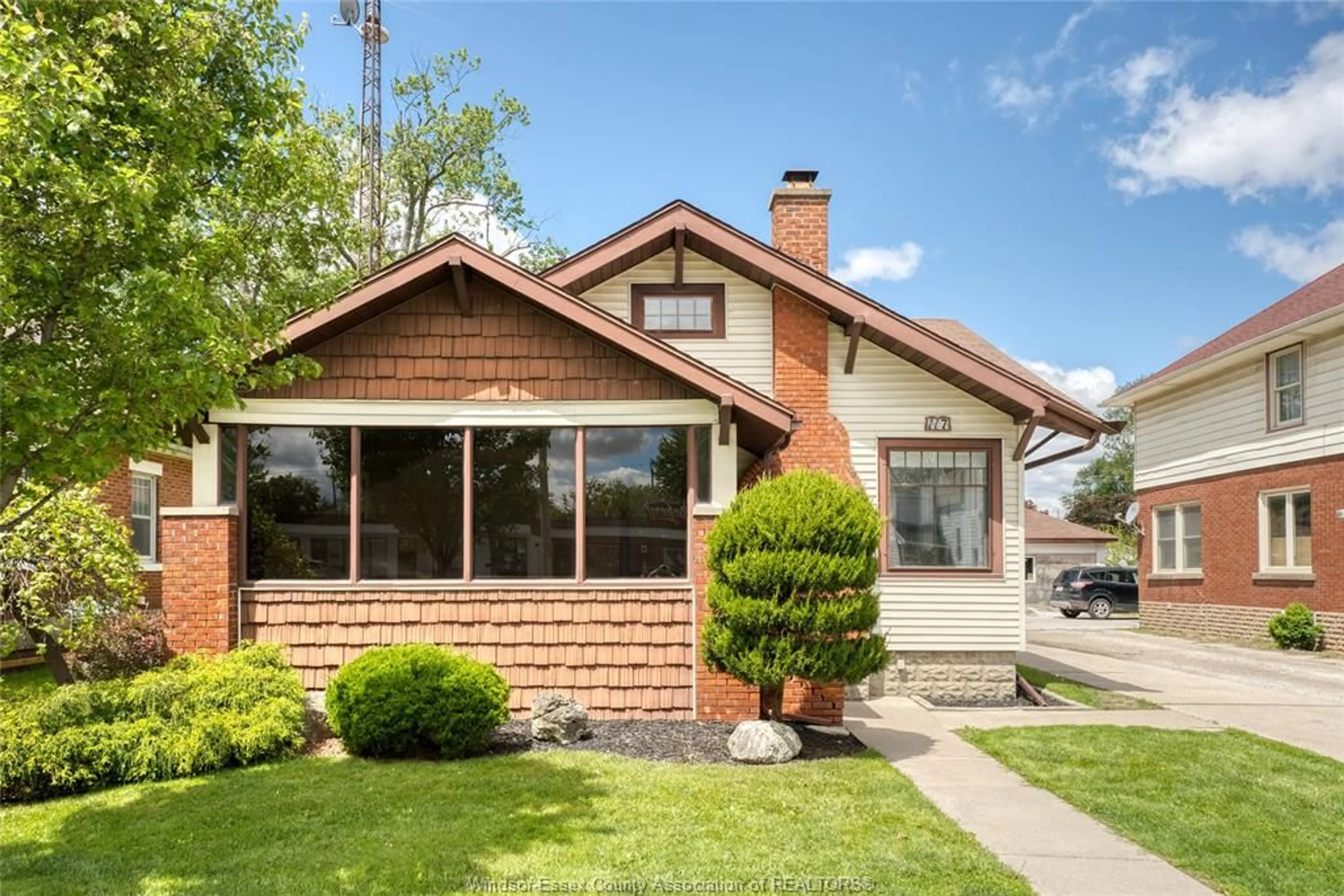 Home with brick exterior material, street for 117 Erie, Leamington Ontario N9H 3B5
