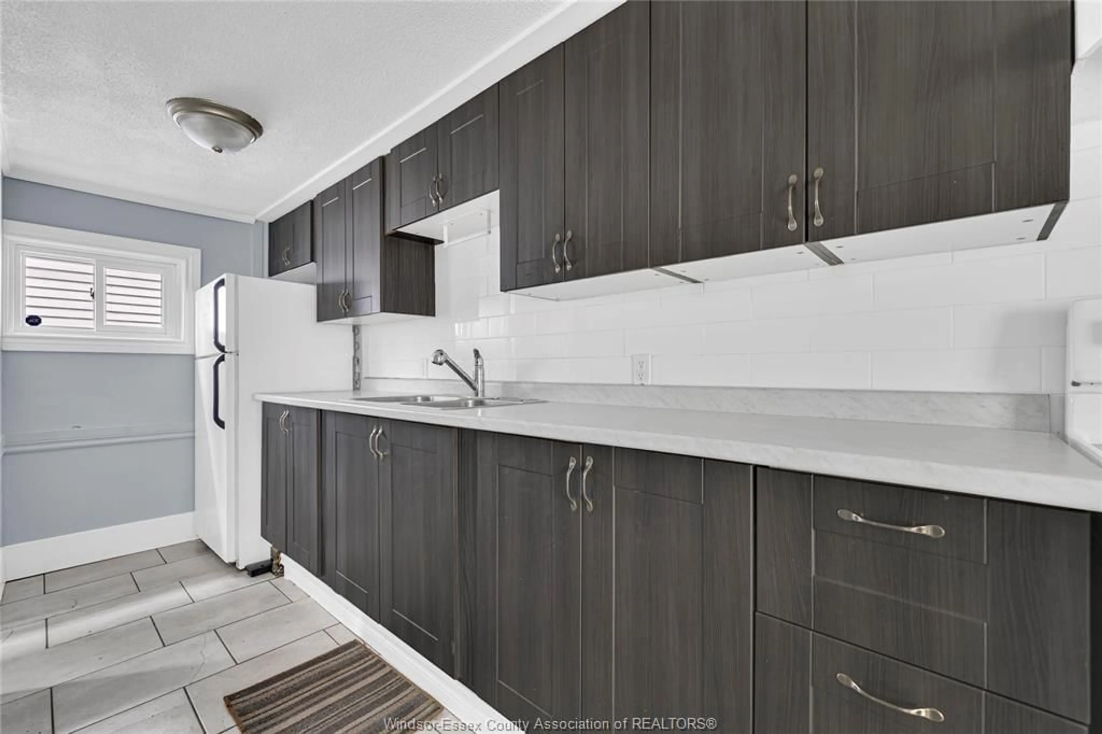 Standard kitchen, ceramic/tile floor for 1030 HIGHLAND Ave, Windsor Ontario N9A 1R7