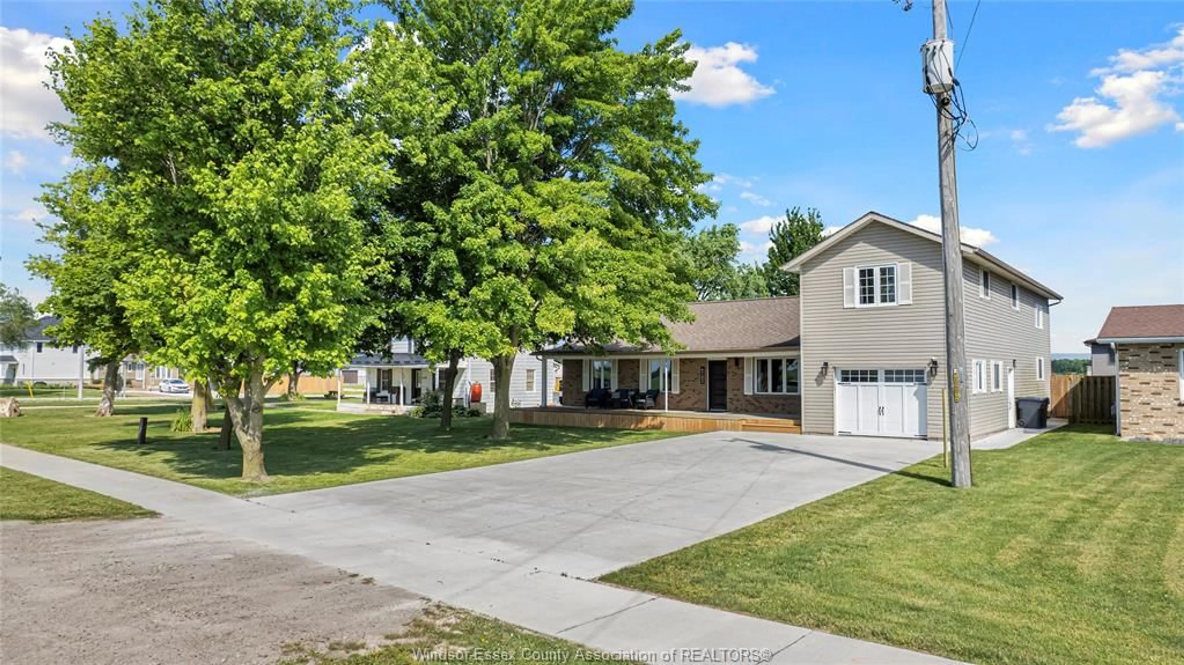 A pic from outside/outdoor area/front of a property/back of a property/a pic from drone, street for 6102 COUNTY ROAD 46, Lakeshore Ontario N0P 1J0