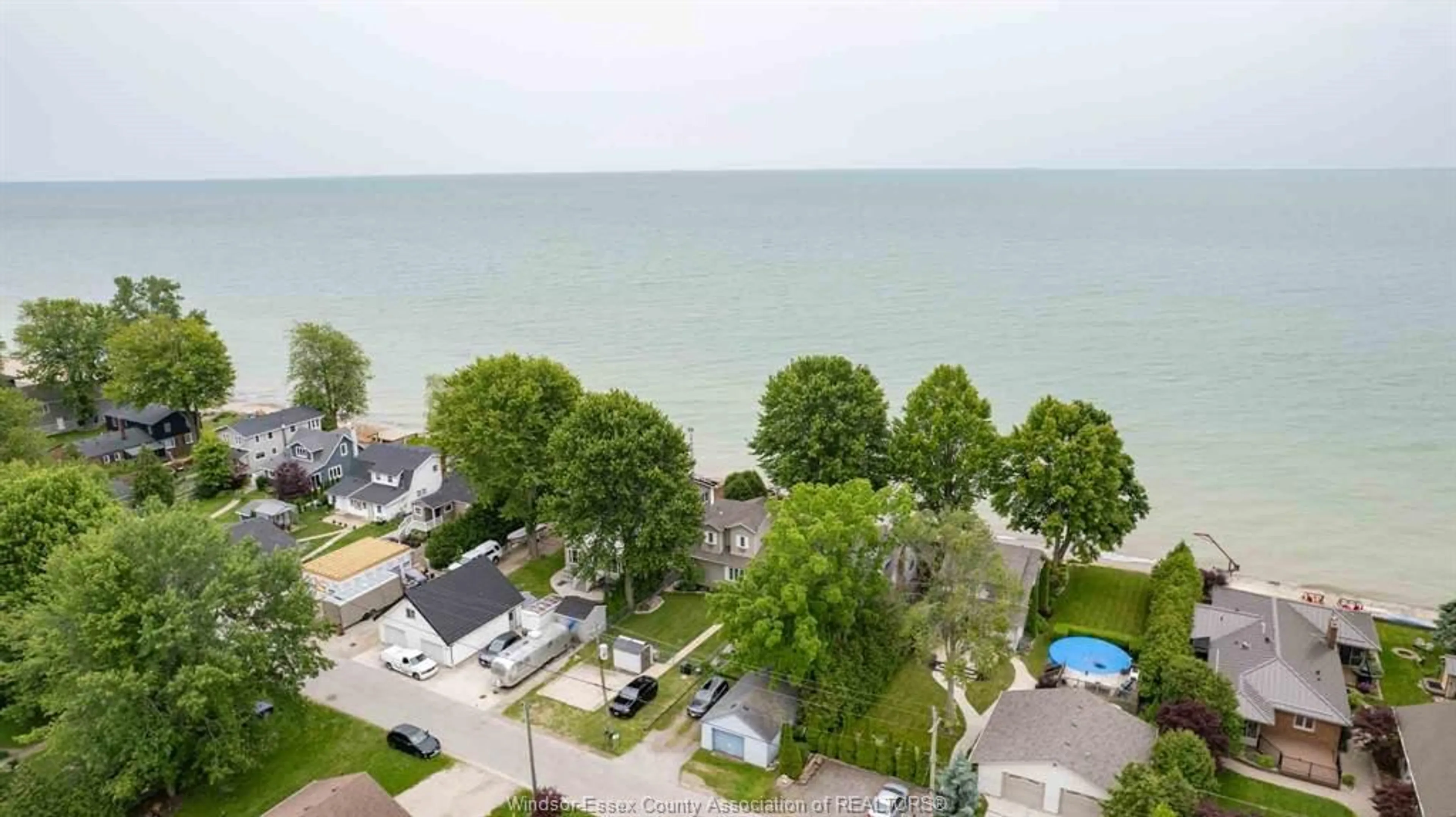 A pic from outside/outdoor area/front of a property/back of a property/a pic from drone, water/lake/river/ocean view for 235 LAKEWOOD Dr, Amherstburg Ontario N9V 2Y8