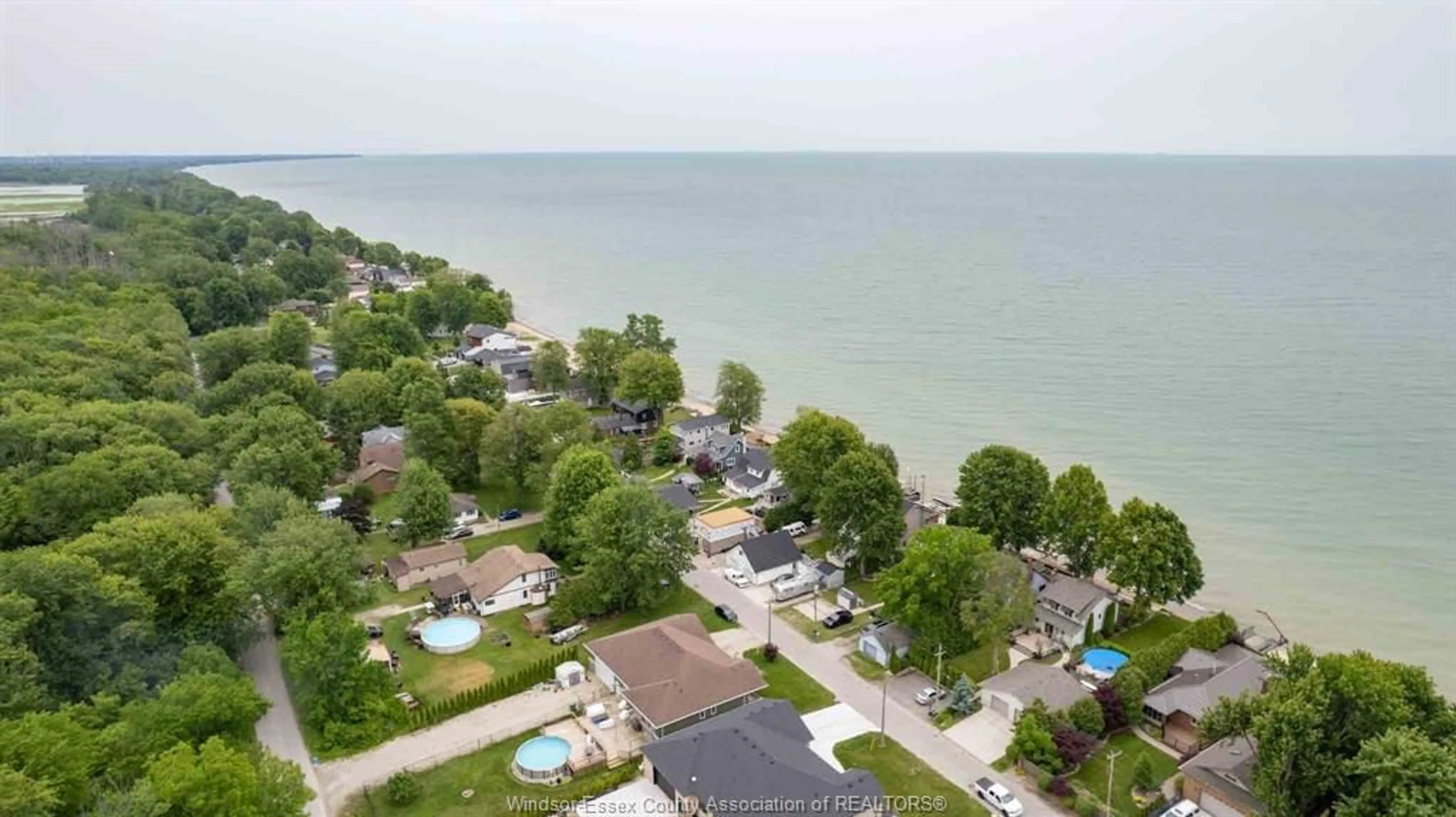 A pic from outside/outdoor area/front of a property/back of a property/a pic from drone, water/lake/river/ocean view for 235 LAKEWOOD Dr, Amherstburg Ontario N9V 2Y8