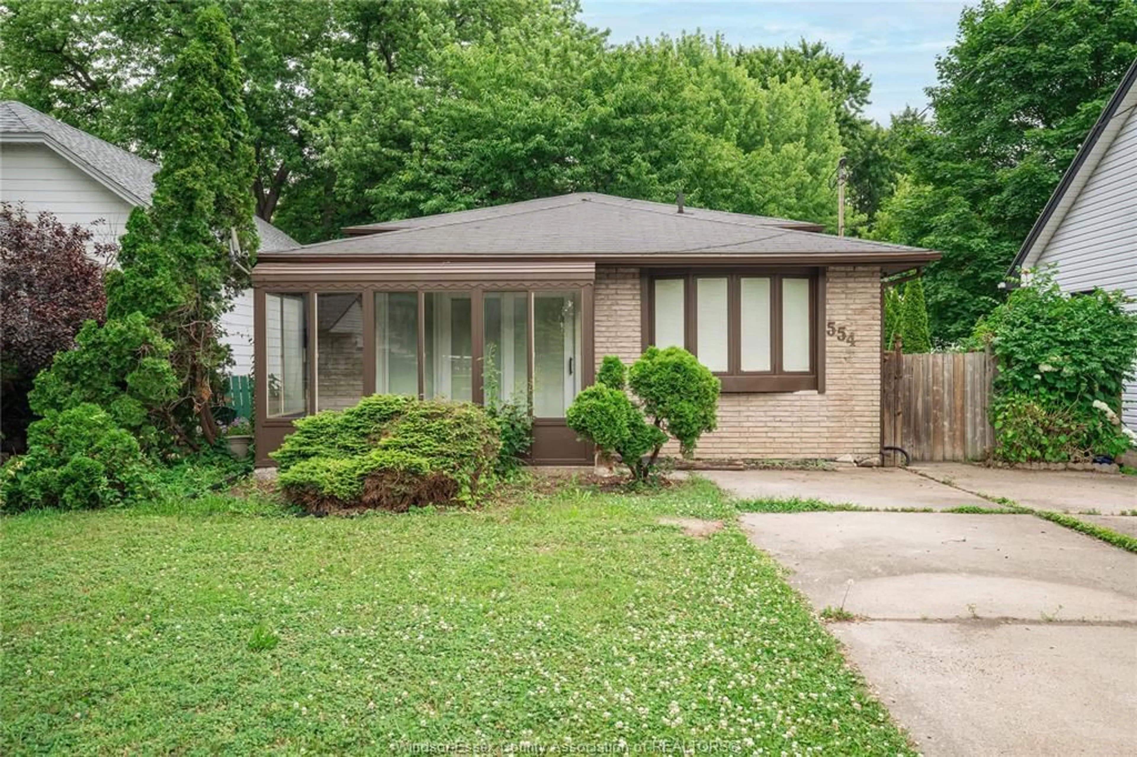 Home with brick exterior material, street for 554 LESPERANCE Rd, Tecumseh Ontario N8N 1W4