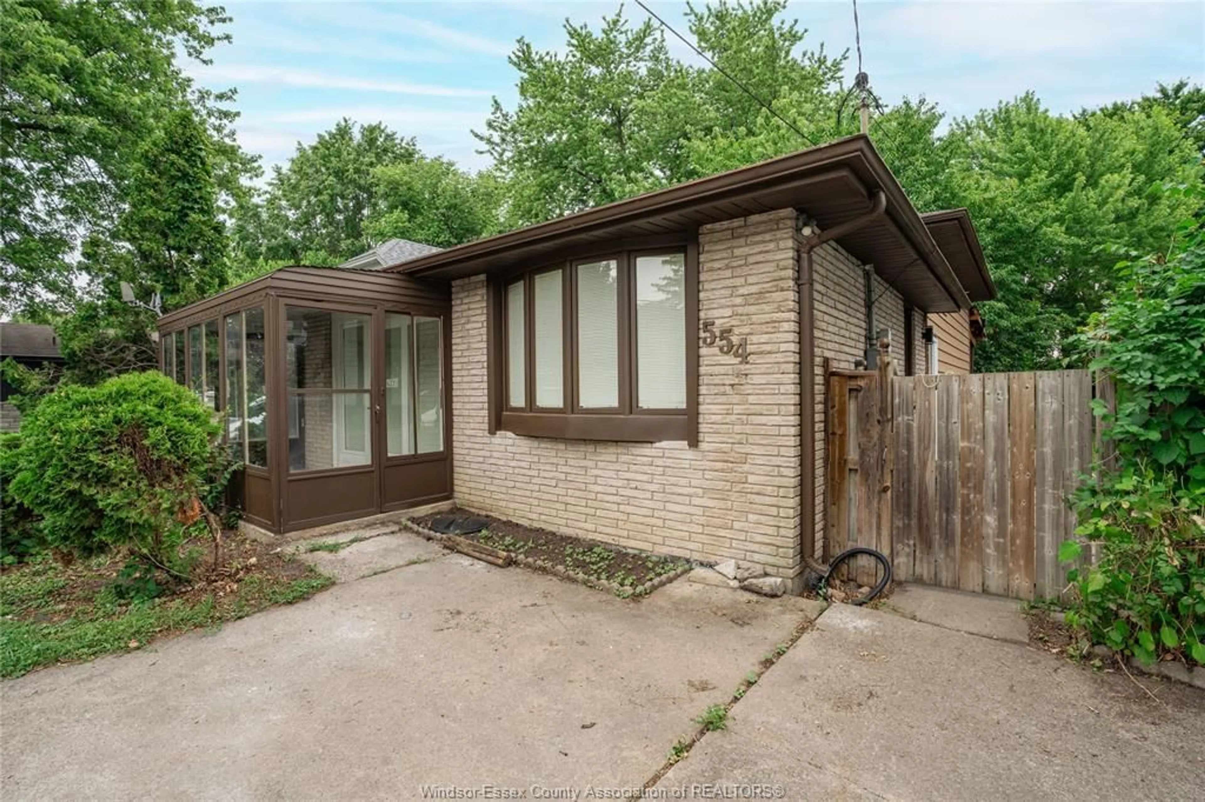 Home with brick exterior material, street for 554 LESPERANCE Rd, Tecumseh Ontario N8N 1W4