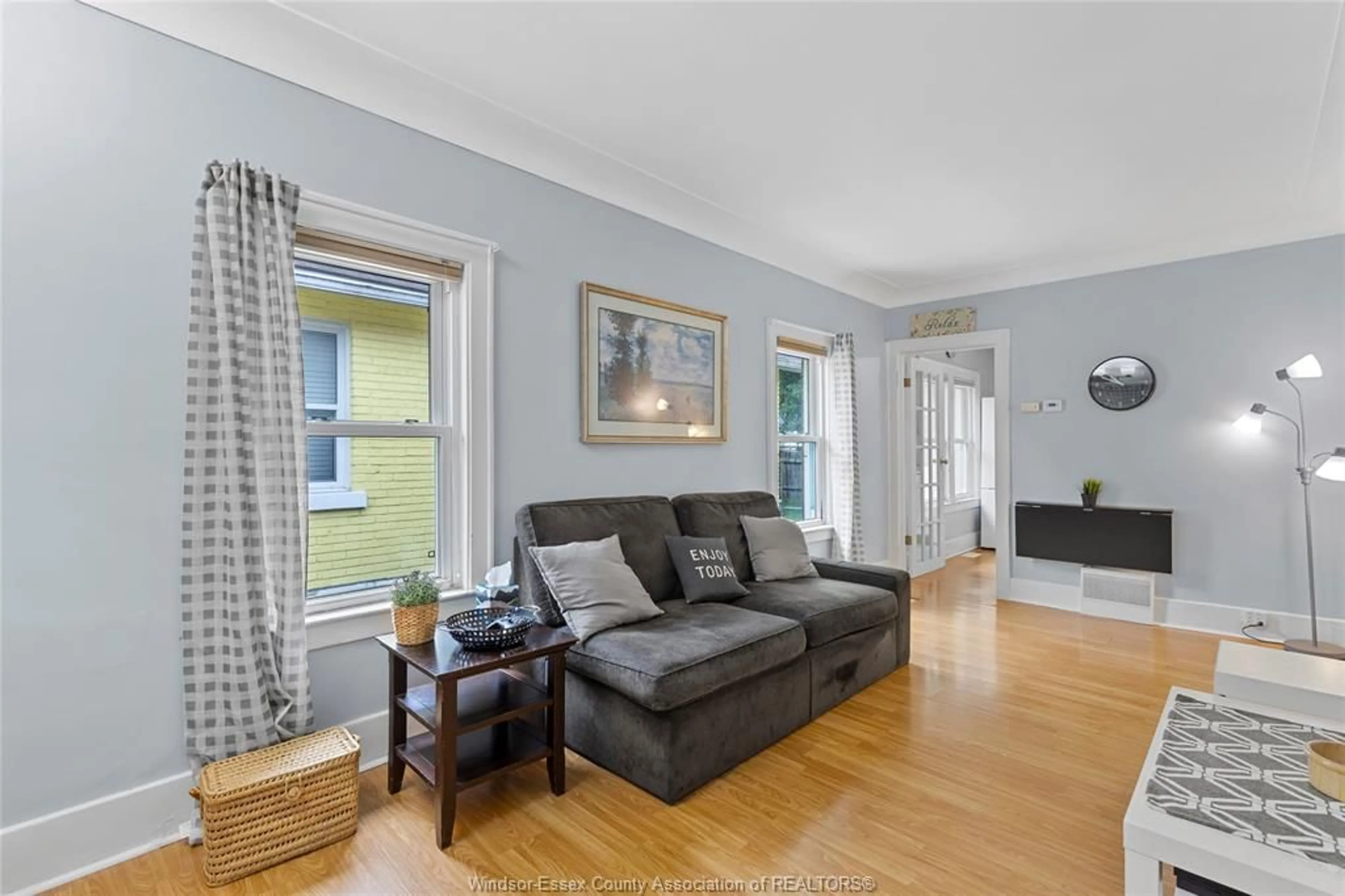 Living room with furniture, wood/laminate floor for 947 JOSEPHINE, Windsor Ontario N9B 2L4