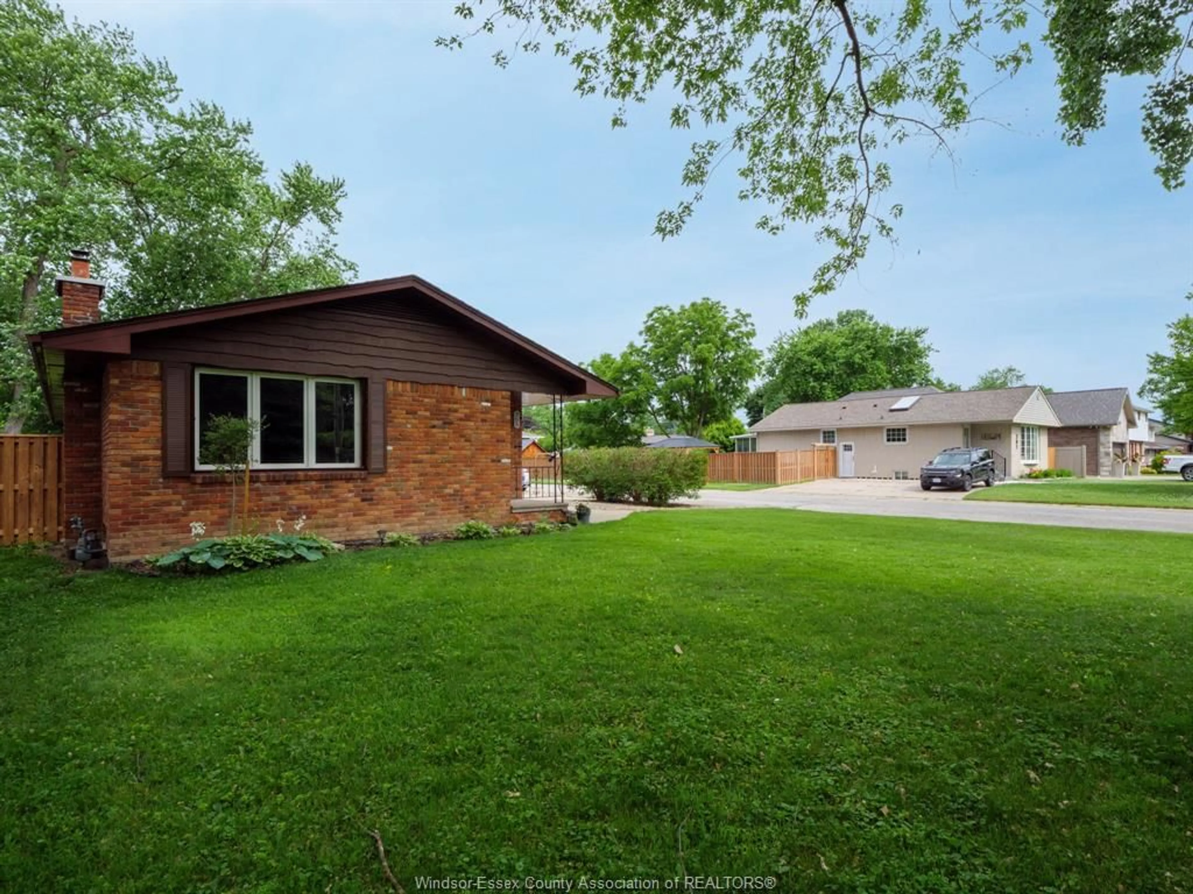 Home with brick exterior material, street for 305 EDGEWATER Blvd, Tecumseh Ontario N8N 2G9