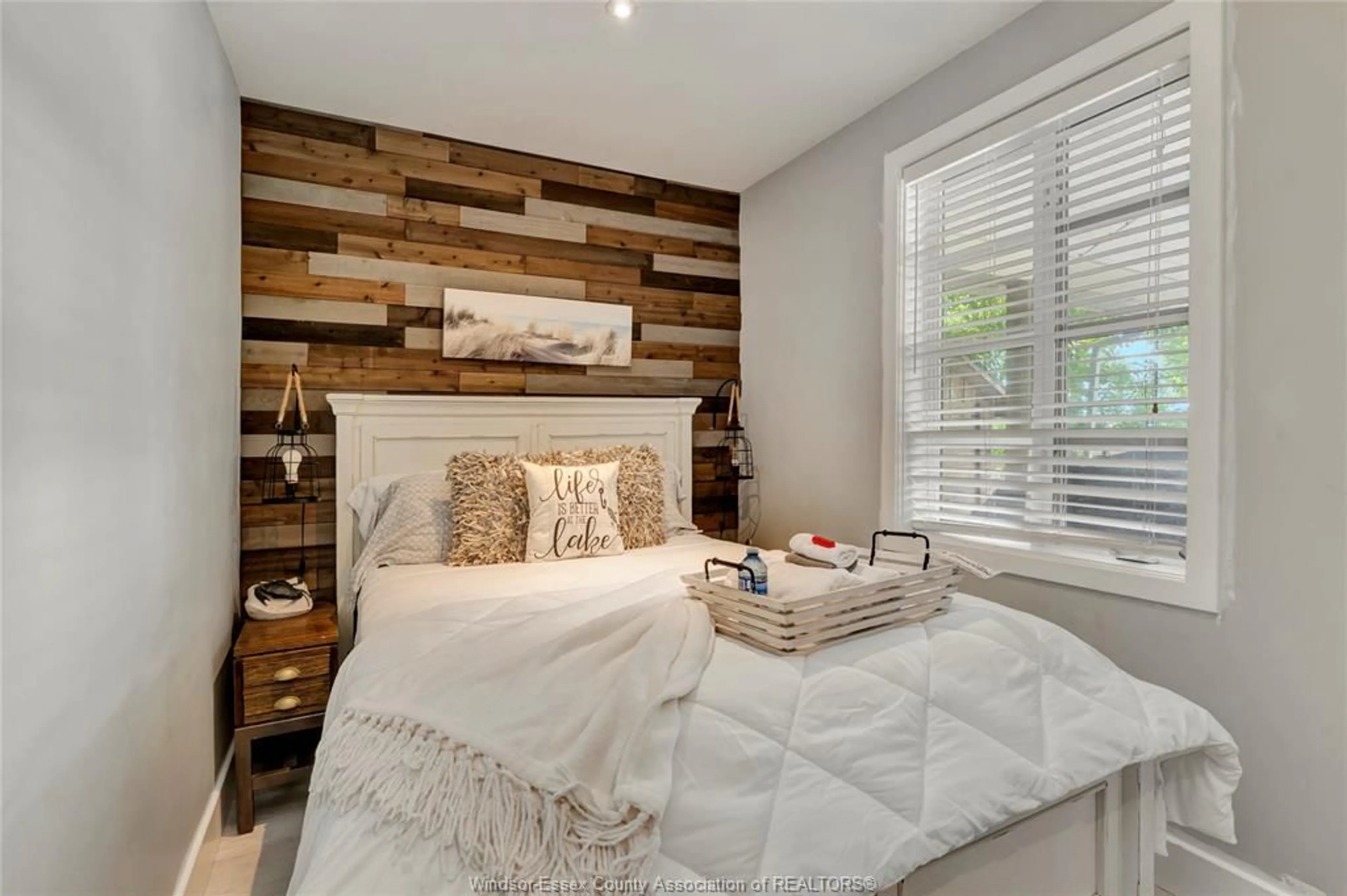 Bedroom with bed, wood/laminate floor for 72 PULLEY Rd, Leamington Ontario N0P 2P0