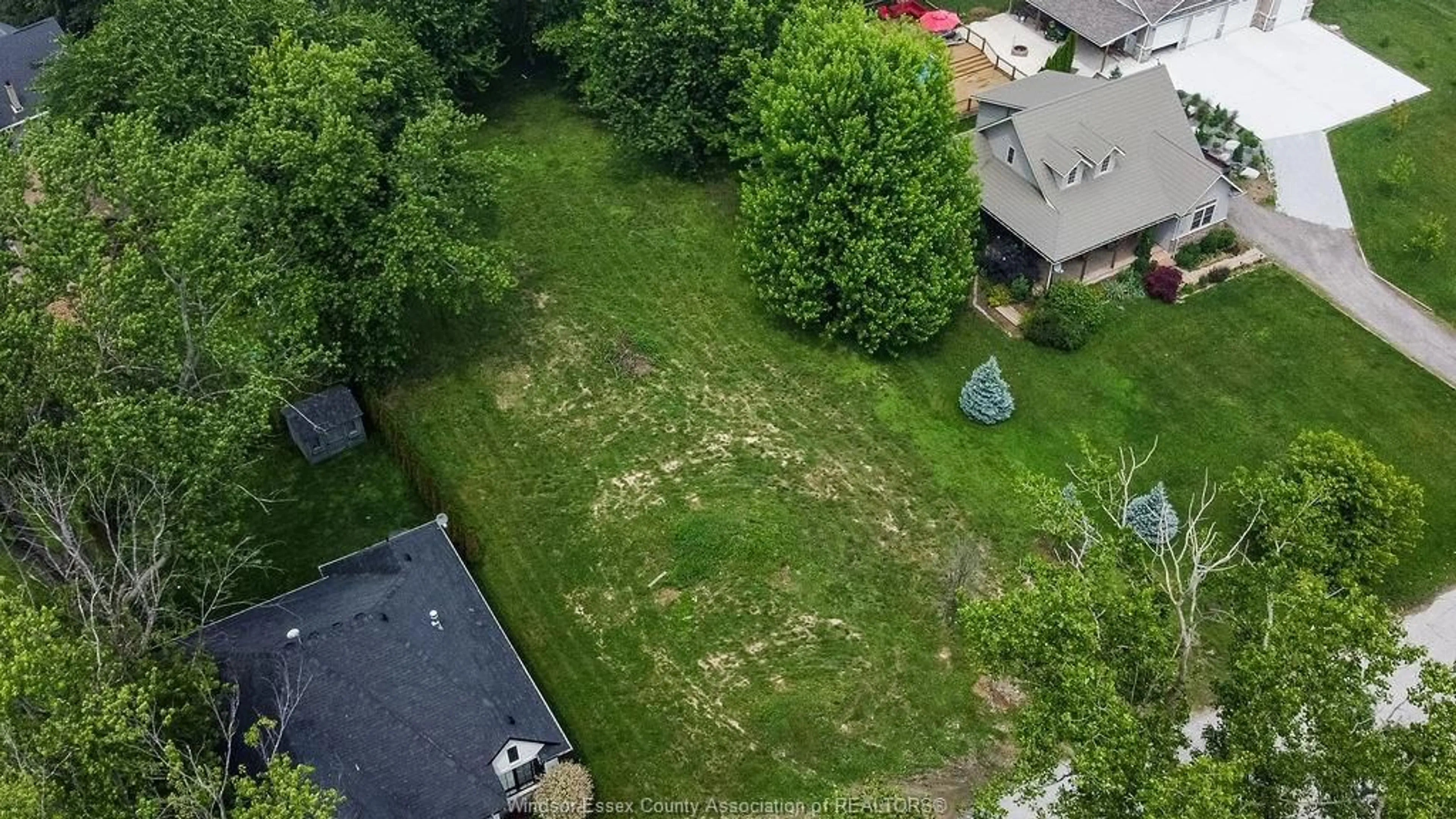 A pic from outside/outdoor area/front of a property/back of a property/a pic from drone, street for 962 WATERS BEACH, Colchester Ontario N0R 1G0