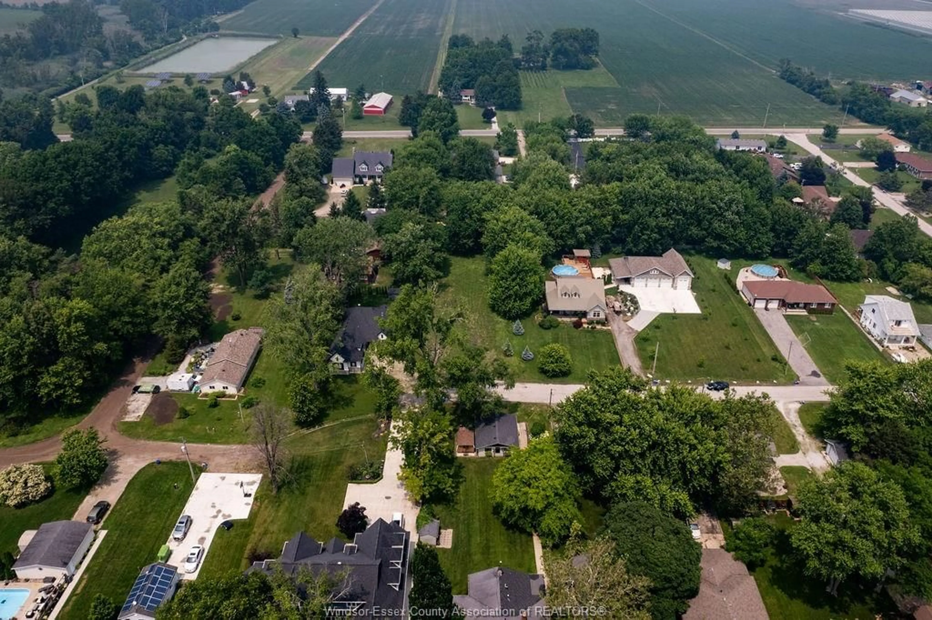 A pic from outside/outdoor area/front of a property/back of a property/a pic from drone, street for 962 WATERS BEACH, Colchester Ontario N0R 1G0