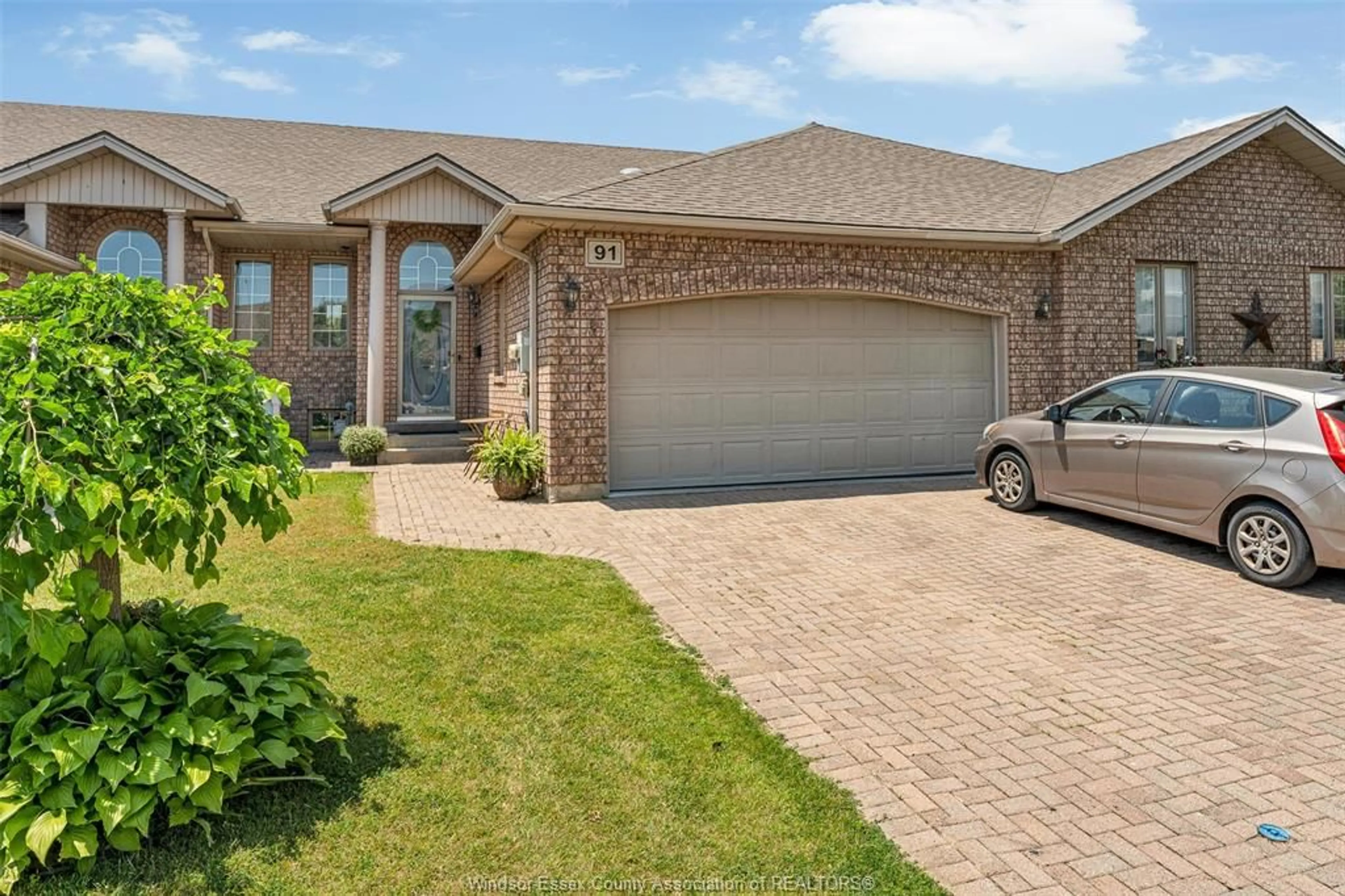 Home with brick exterior material, street for 91 THERESA Trail, Leamington Ontario N8H 5M8