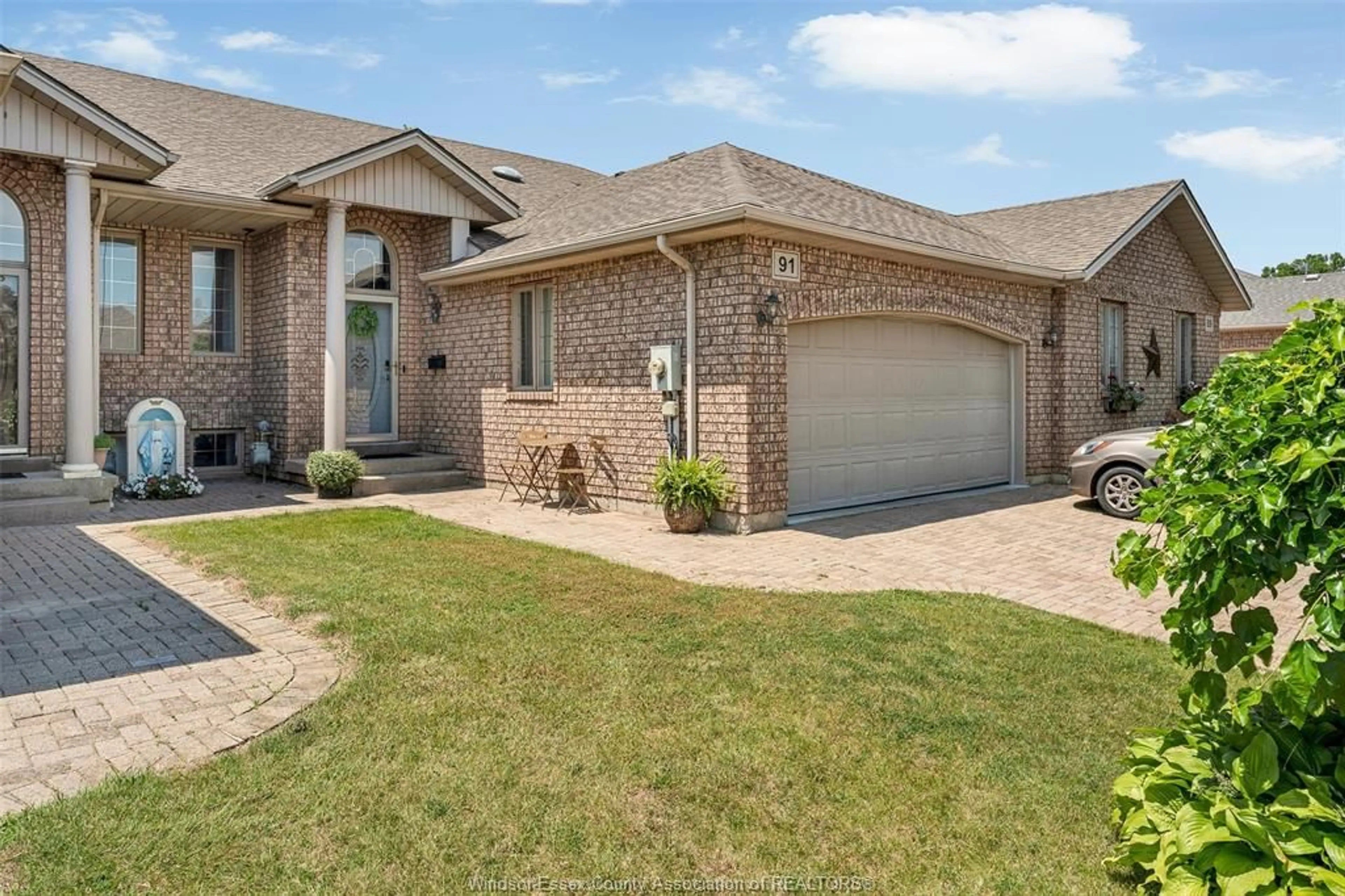 Home with brick exterior material, street for 91 THERESA Trail, Leamington Ontario N8H 5M8