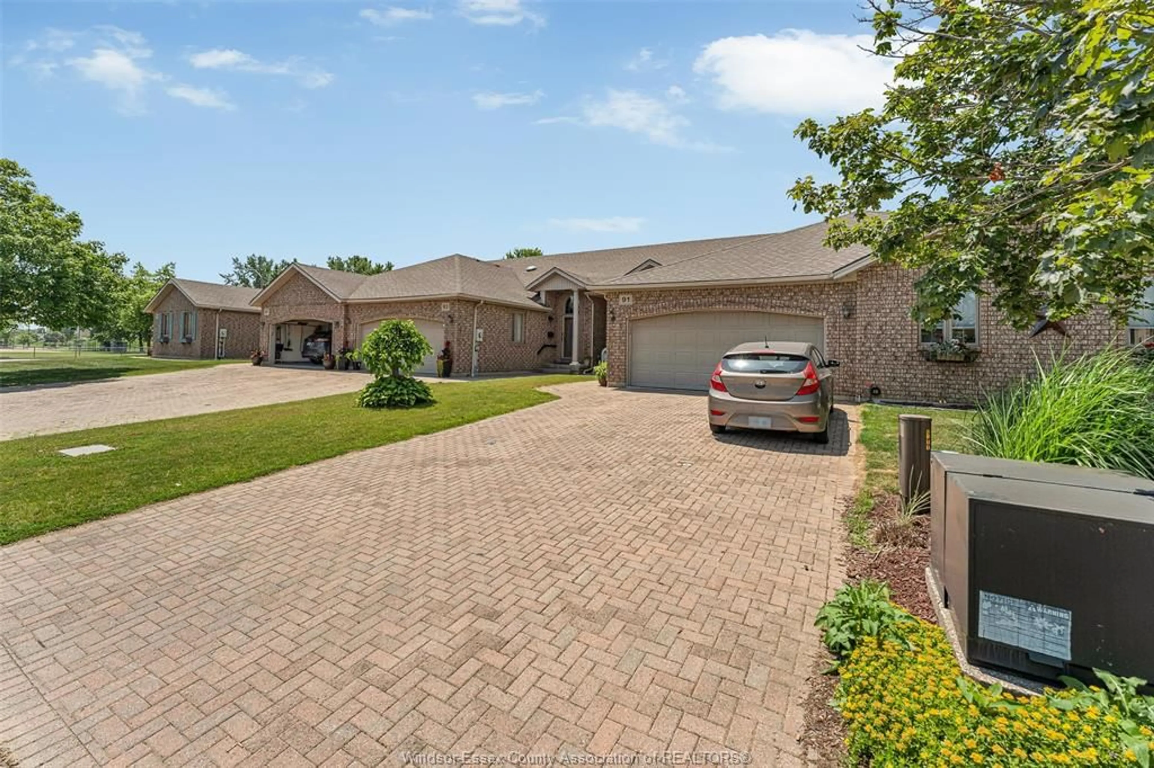 A pic from outside/outdoor area/front of a property/back of a property/a pic from drone, street for 91 THERESA Trail, Leamington Ontario N8H 5M8