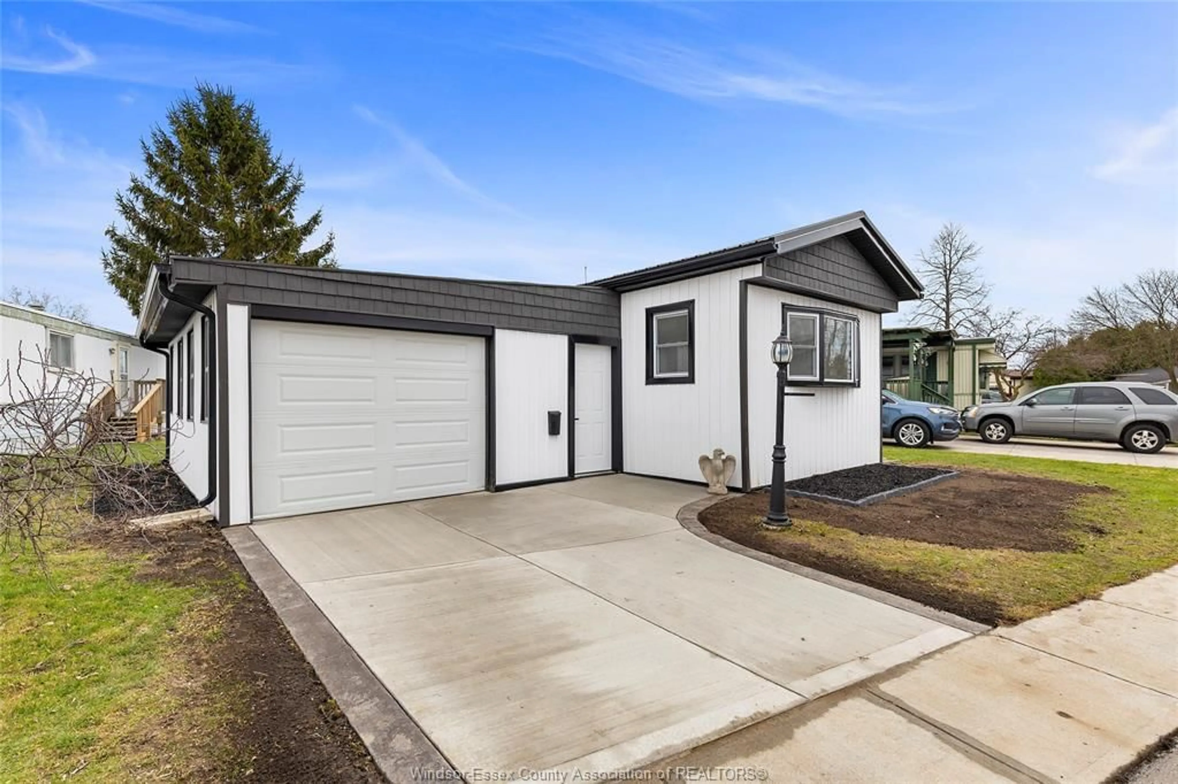 Home with vinyl exterior material, street for 83 MIRIAM, Essex Ontario N8M 1Z8