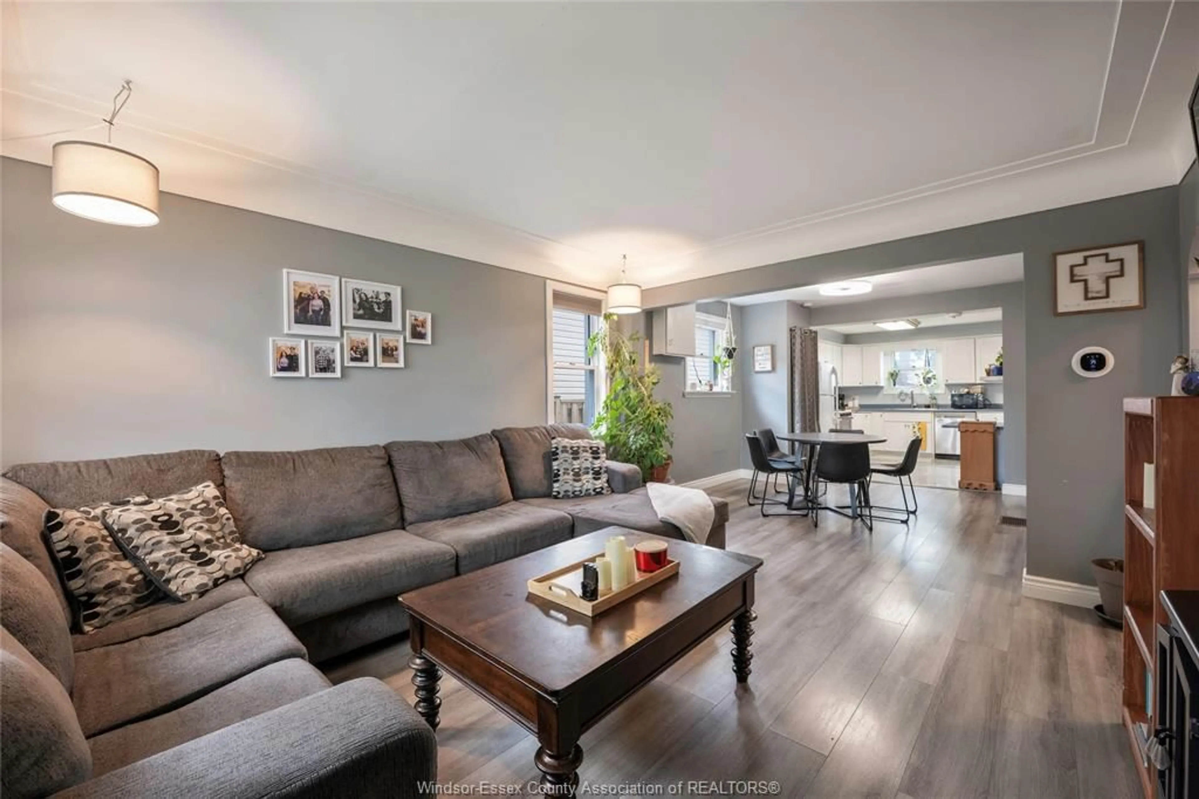 Living room with furniture, wood/laminate floor for 1892 Westminster Blvd, Windsor Ontario N8T 1X4