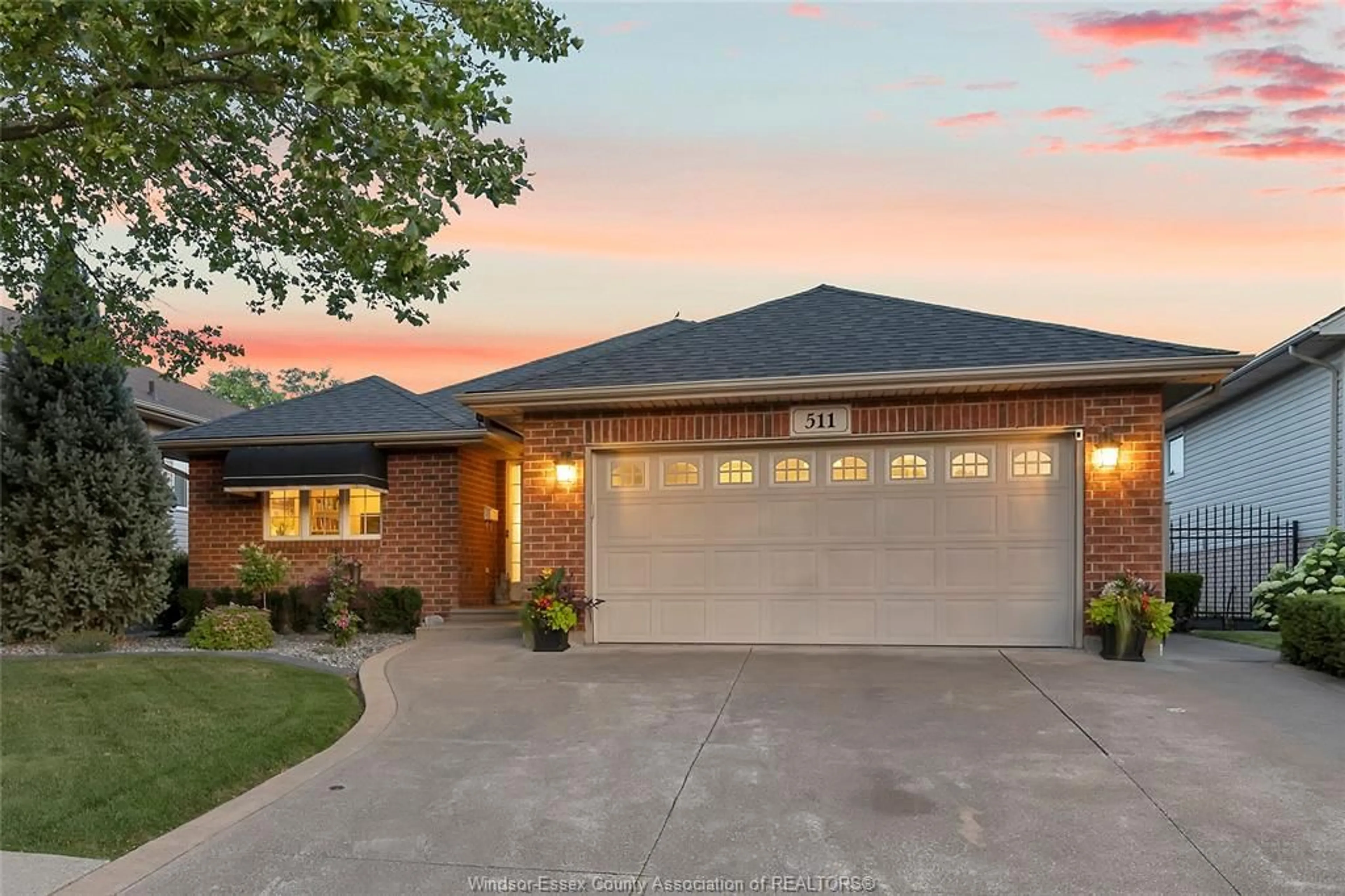 Home with brick exterior material, street for 511 Novello Crescent, Windsor Ontario N8P 1S4