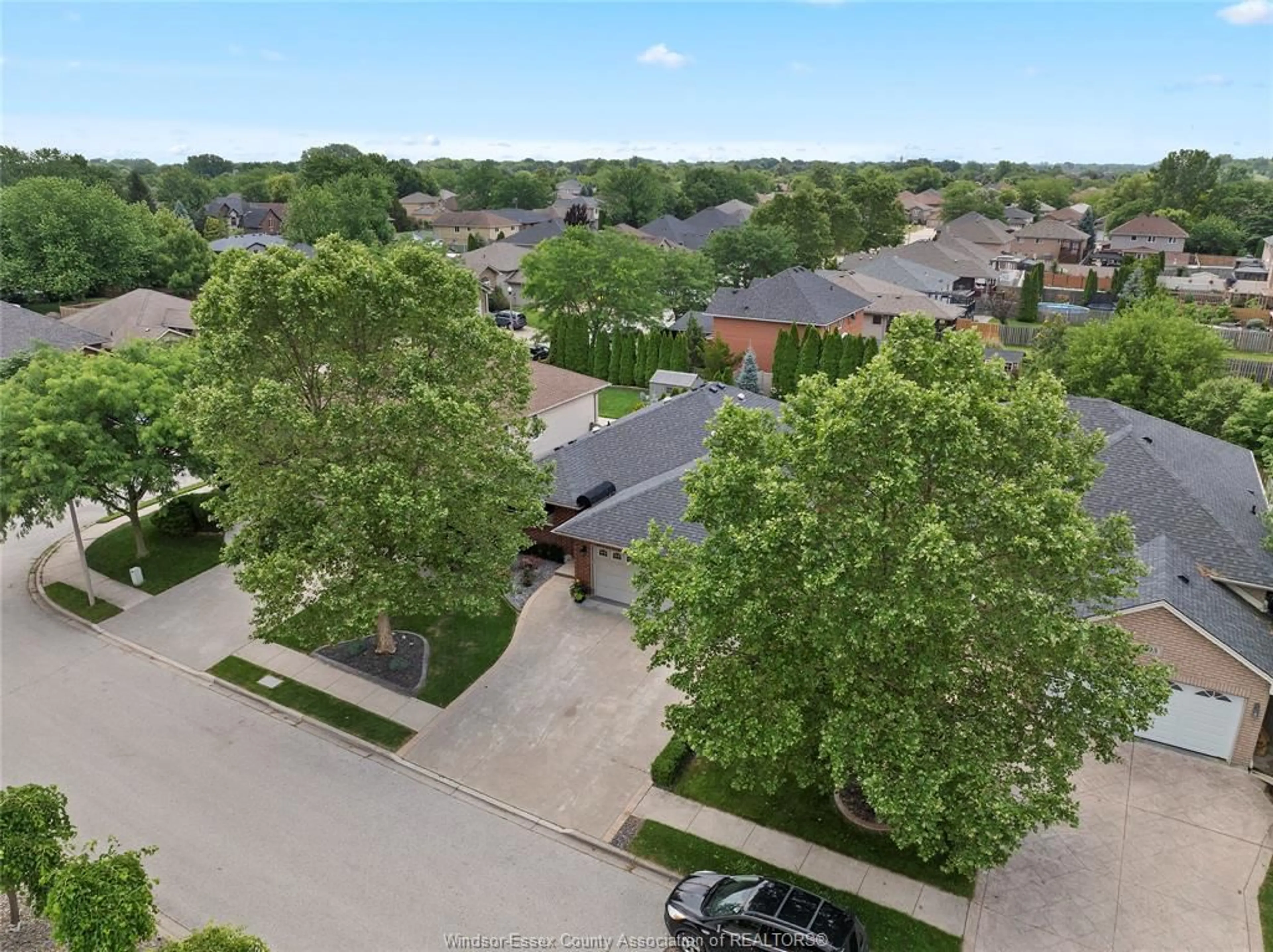 A pic from outside/outdoor area/front of a property/back of a property/a pic from drone, street for 511 Novello Crescent, Windsor Ontario N8P 1S4
