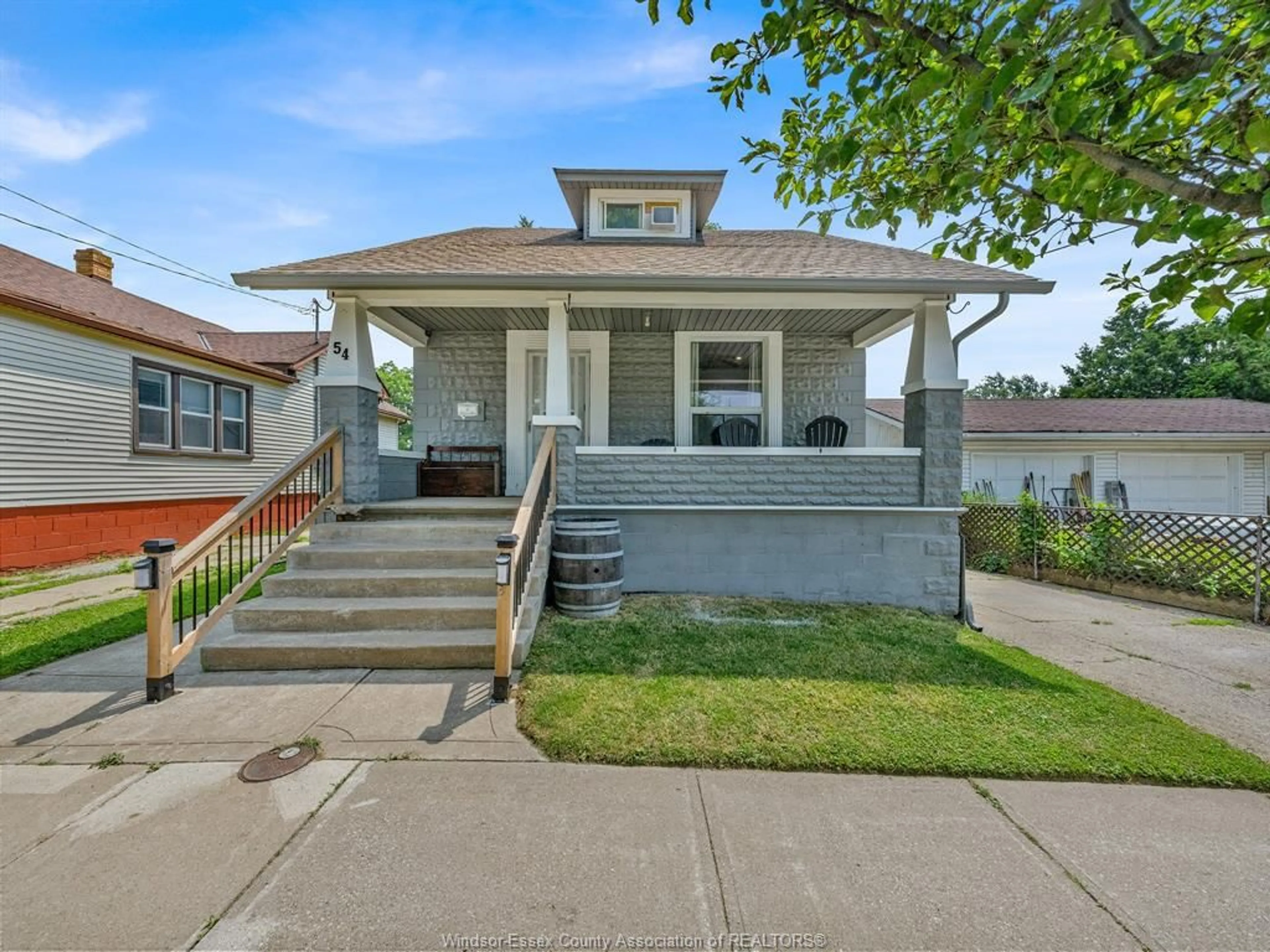 Home with vinyl exterior material, street for 54 Princess St, Leamington Ontario N8H 2Y4