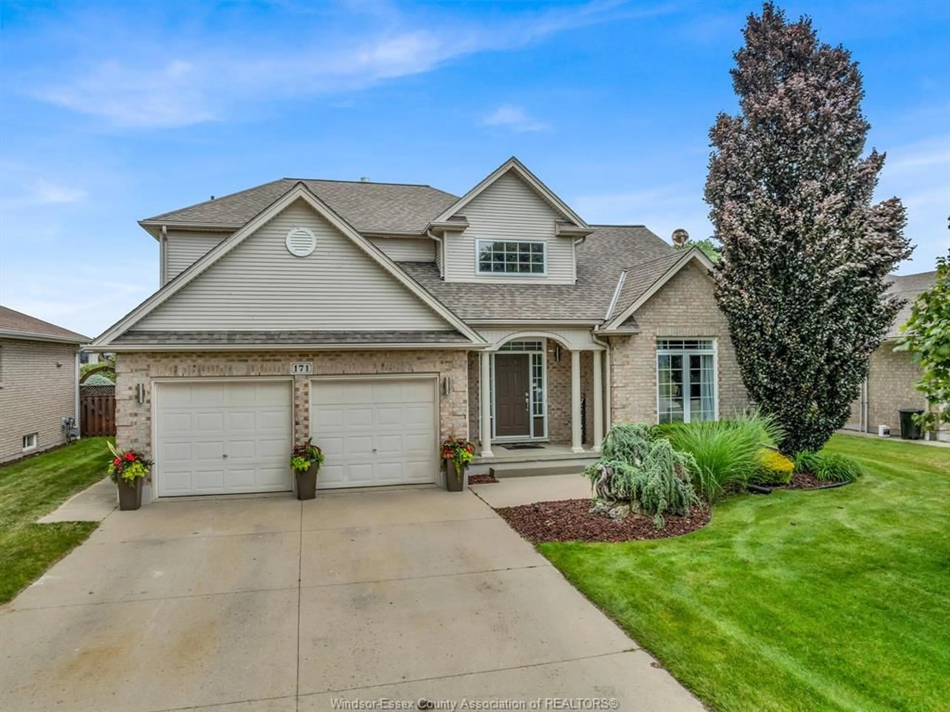 Home with brick exterior material, street for 171 Ellison Ave, Leamington Ontario N8H 5J2