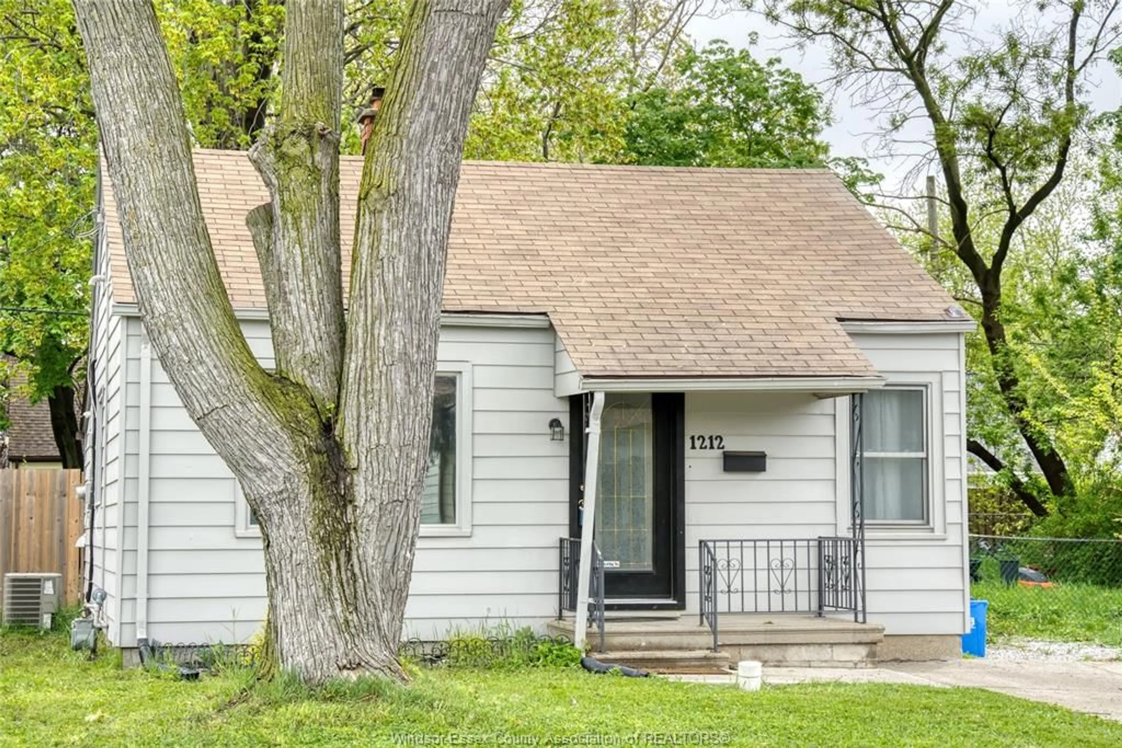 Home with vinyl exterior material, street for 1212 Elm Ave, Windsor Ontario N8X 2B5