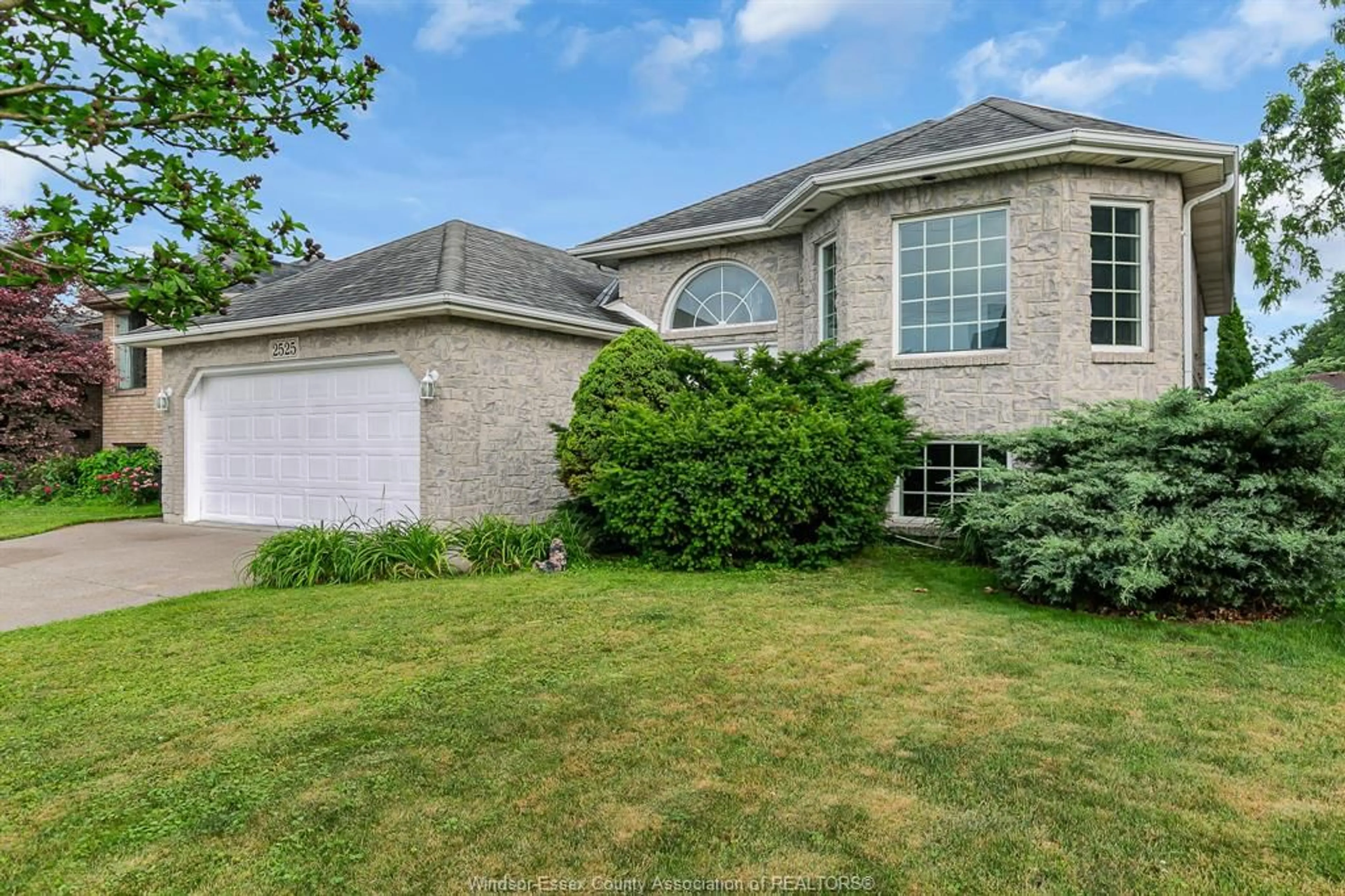 Home with brick exterior material, street for 2525 LABELLE, Windsor Ontario N9E 4K4