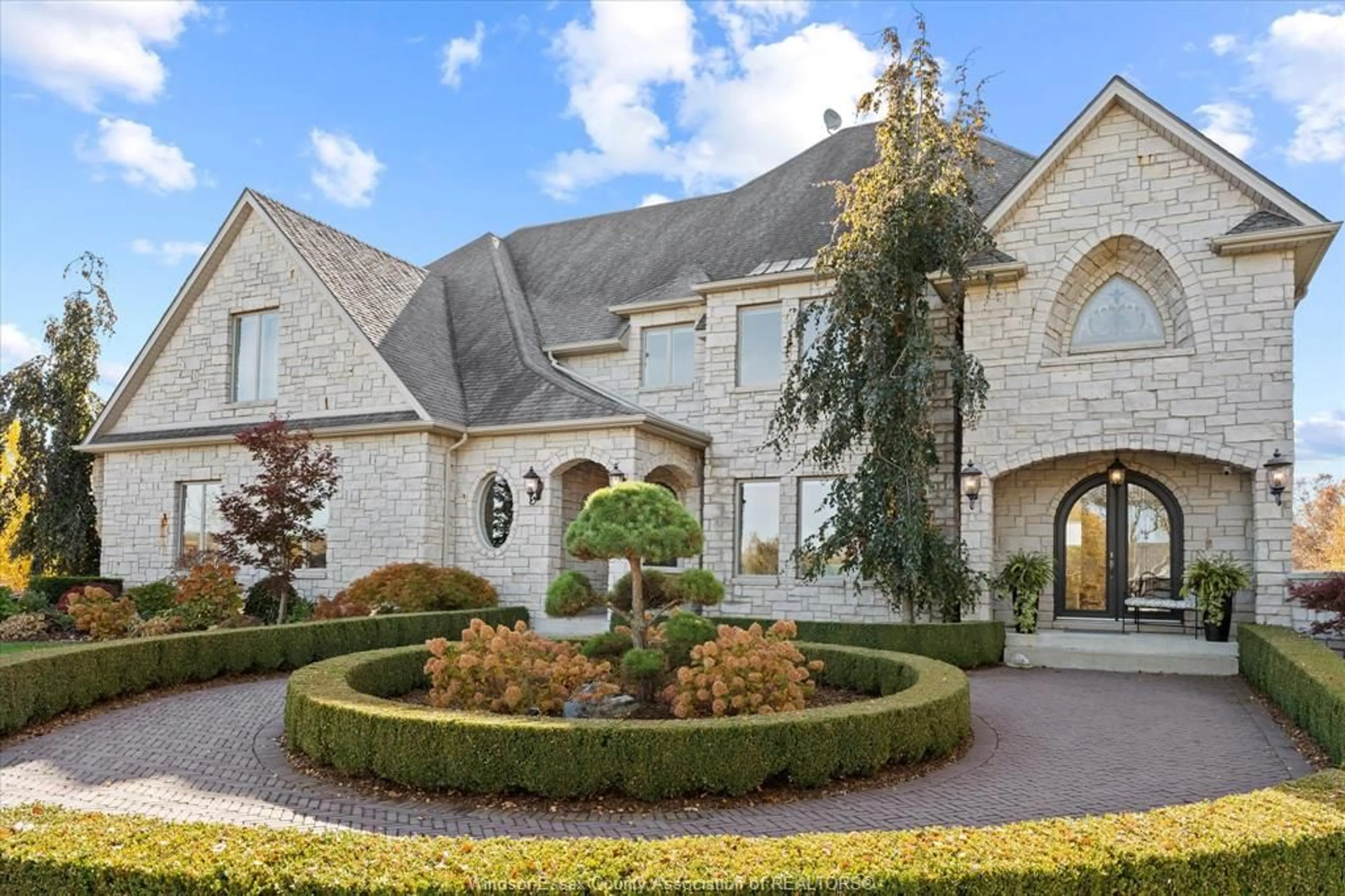 Home with brick exterior material, street for 4863 4TH CONCESSION, Essex Ontario N0R 1G0