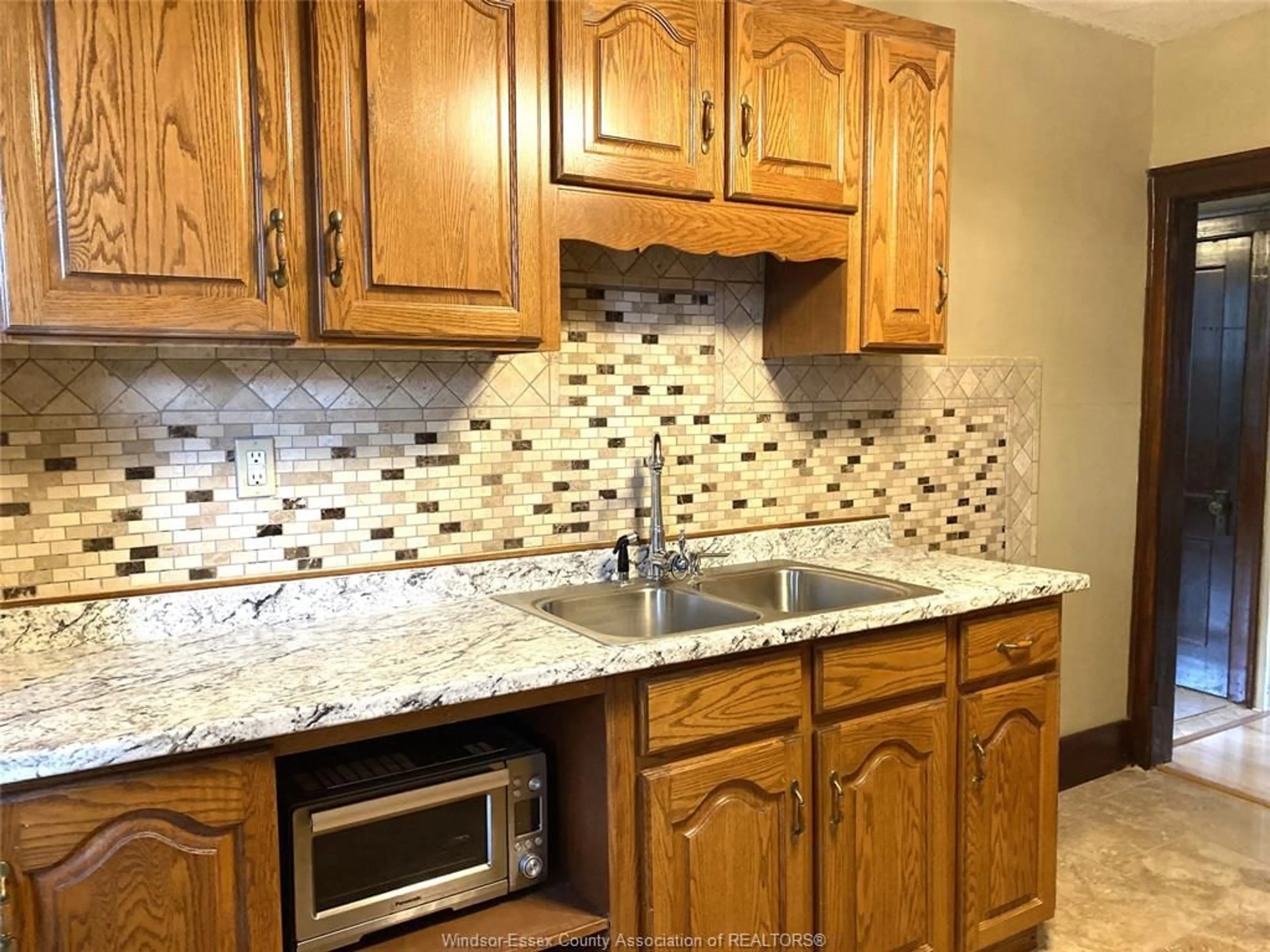 Standard kitchen, ceramic/tile floor for 1951 TOURANGEAU Rd, Windsor Ontario N8W 4N4