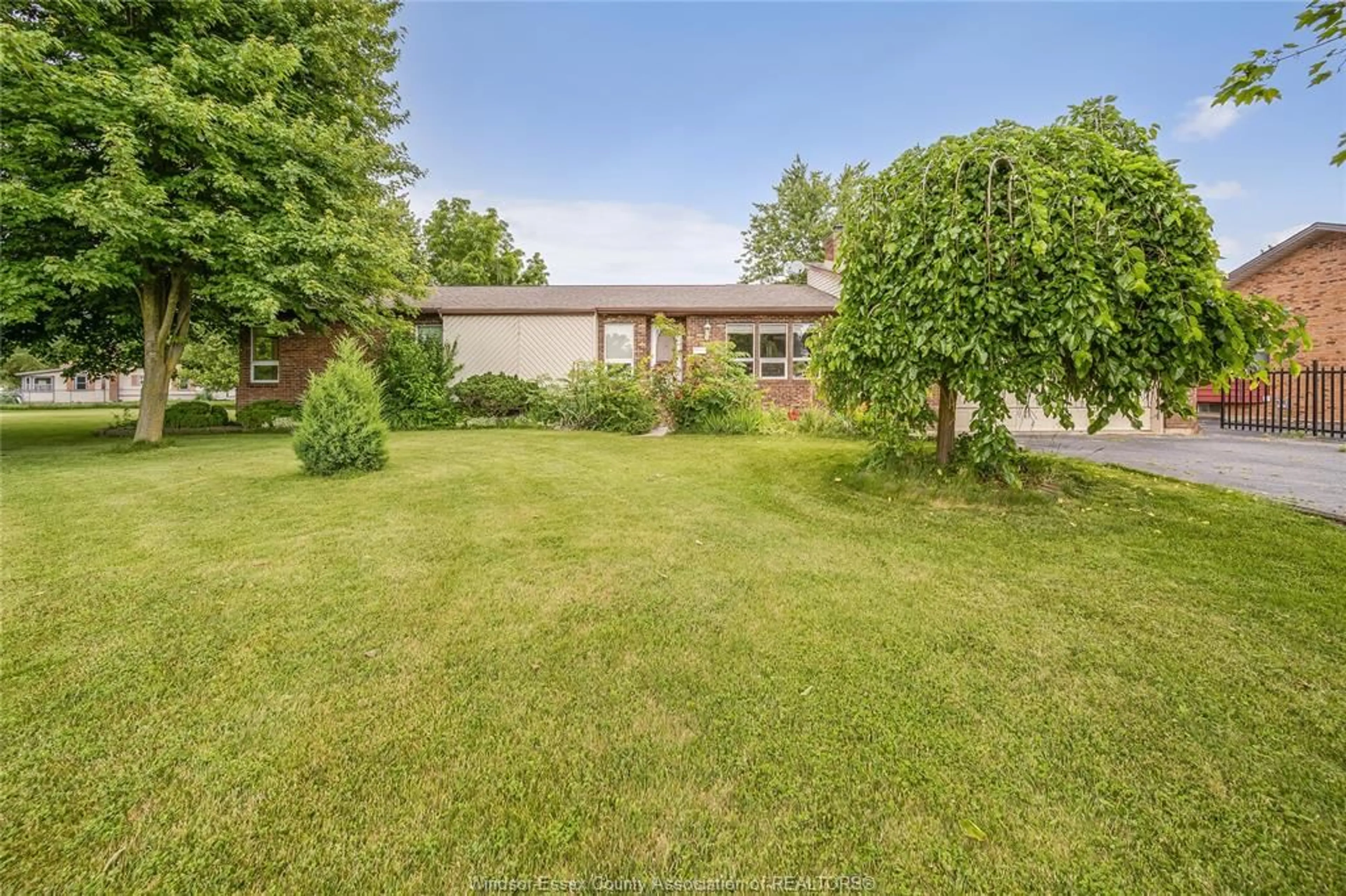 A pic from outside/outdoor area/front of a property/back of a property/a pic from drone, unknown for 1401 FRONT Rd, Amherstburg Ontario N9V 2M5