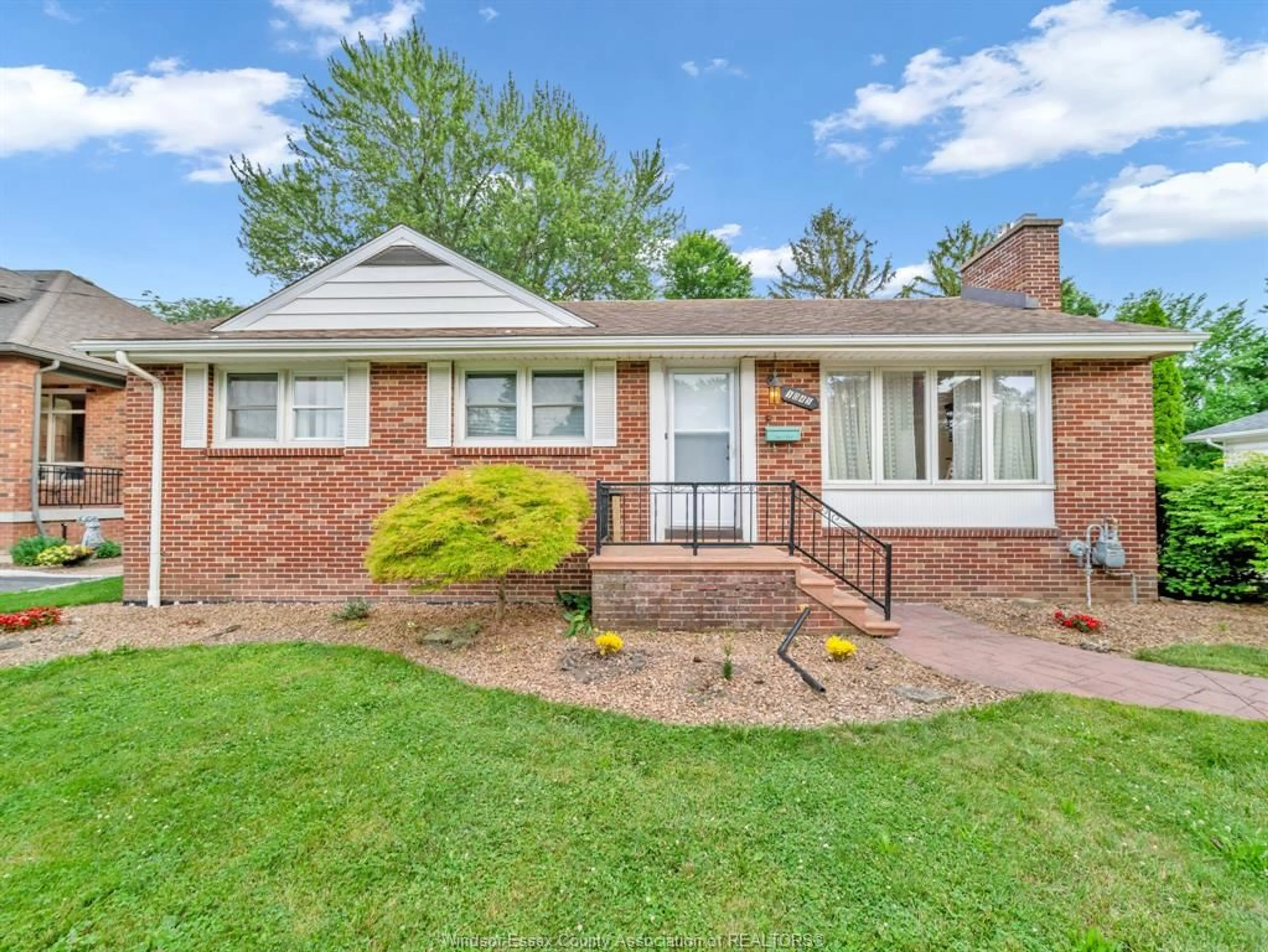 Home with brick exterior material, street for 1045 CABANA Rd, Windsor Ontario N9G 1B6