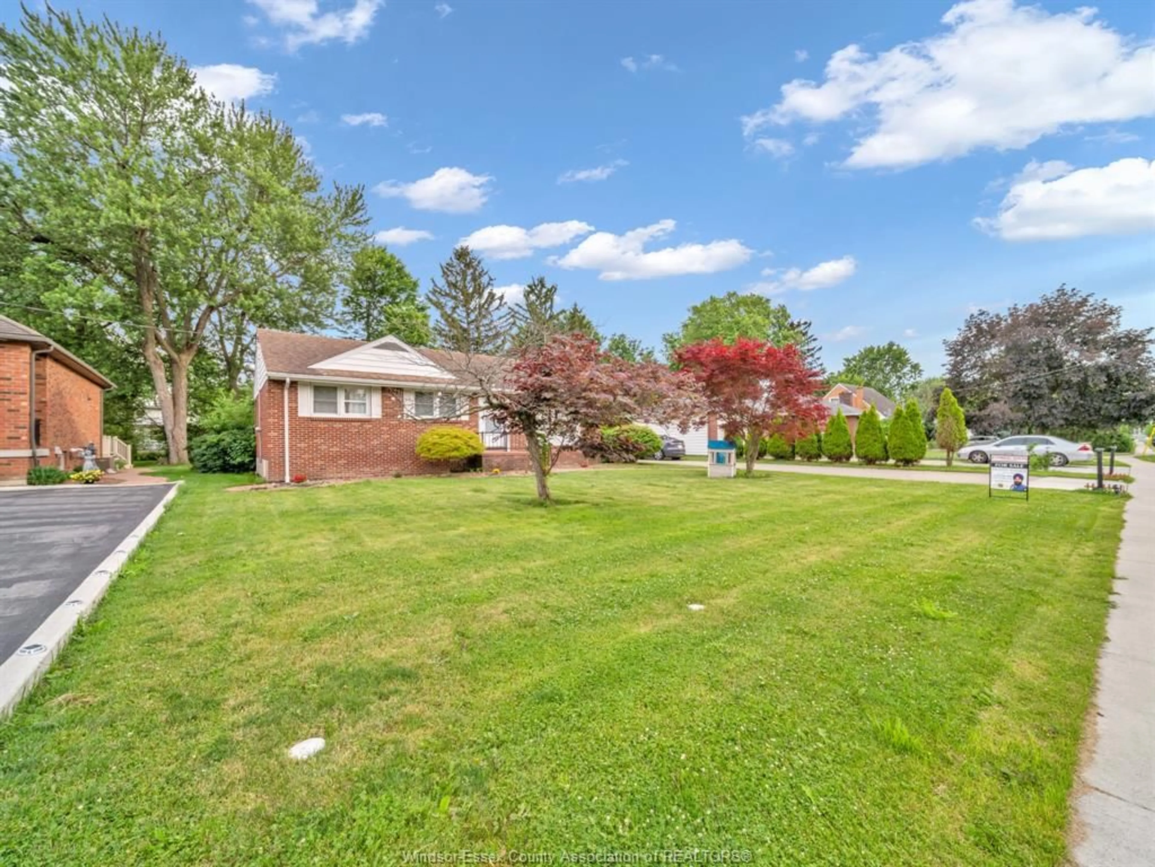 A pic from outside/outdoor area/front of a property/back of a property/a pic from drone, water/lake/river/ocean view for 1045 CABANA Rd, Windsor Ontario N9G 1B6