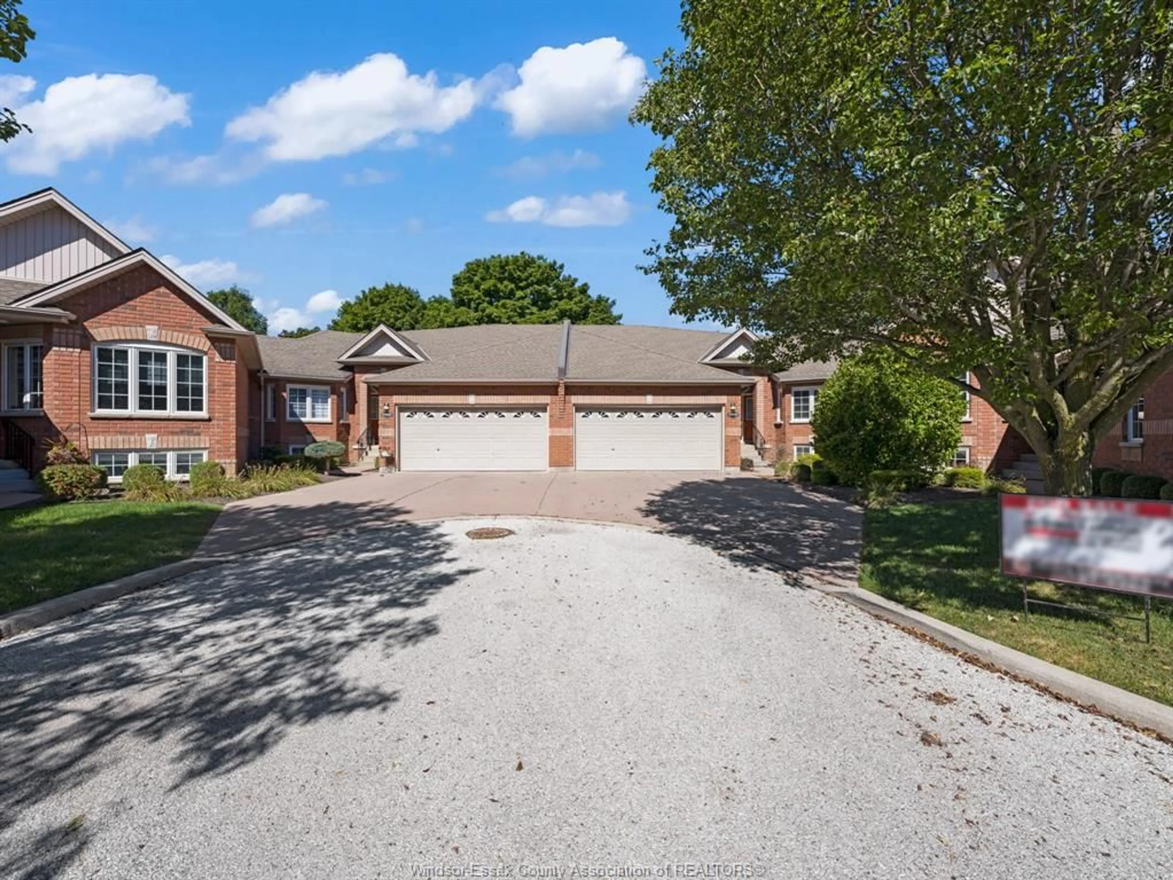 Home with brick exterior material, street for 32 ROBSON Rd #4, Leamington Ontario N8H 2M9
