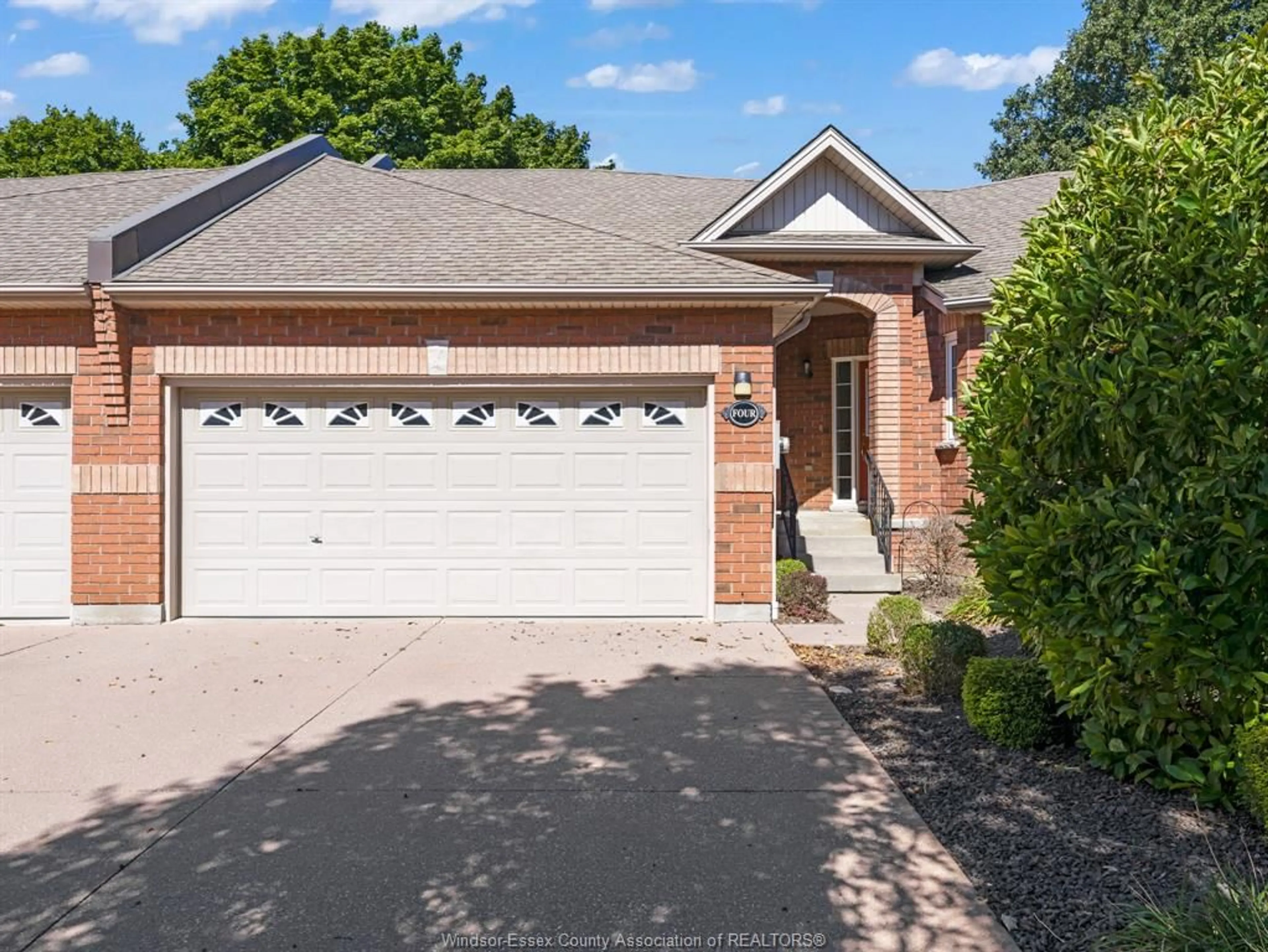 Home with brick exterior material, street for 32 ROBSON Rd #4, Leamington Ontario N8H 2M9