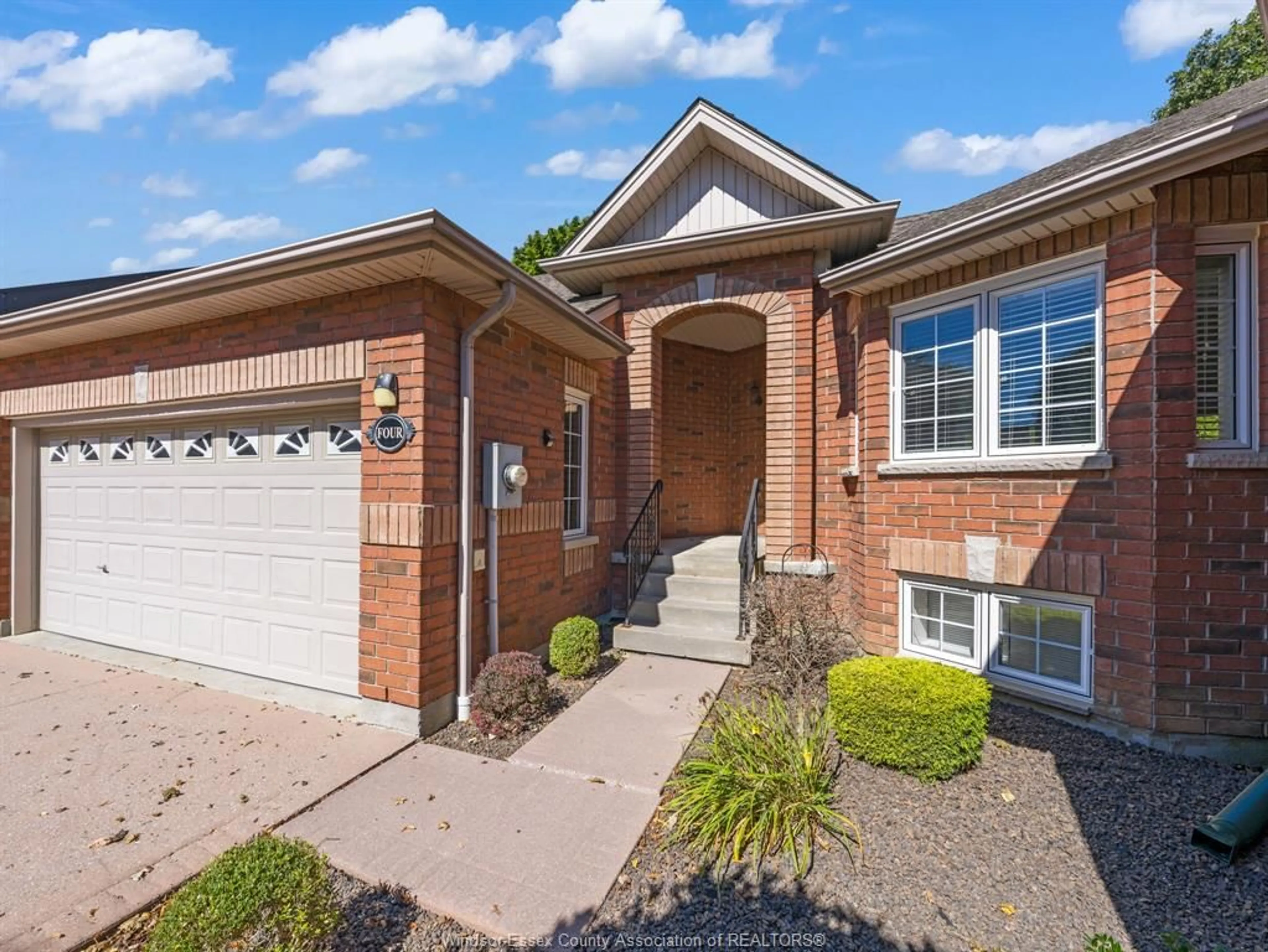 Home with brick exterior material, street for 32 ROBSON Rd #4, Leamington Ontario N8H 2M9