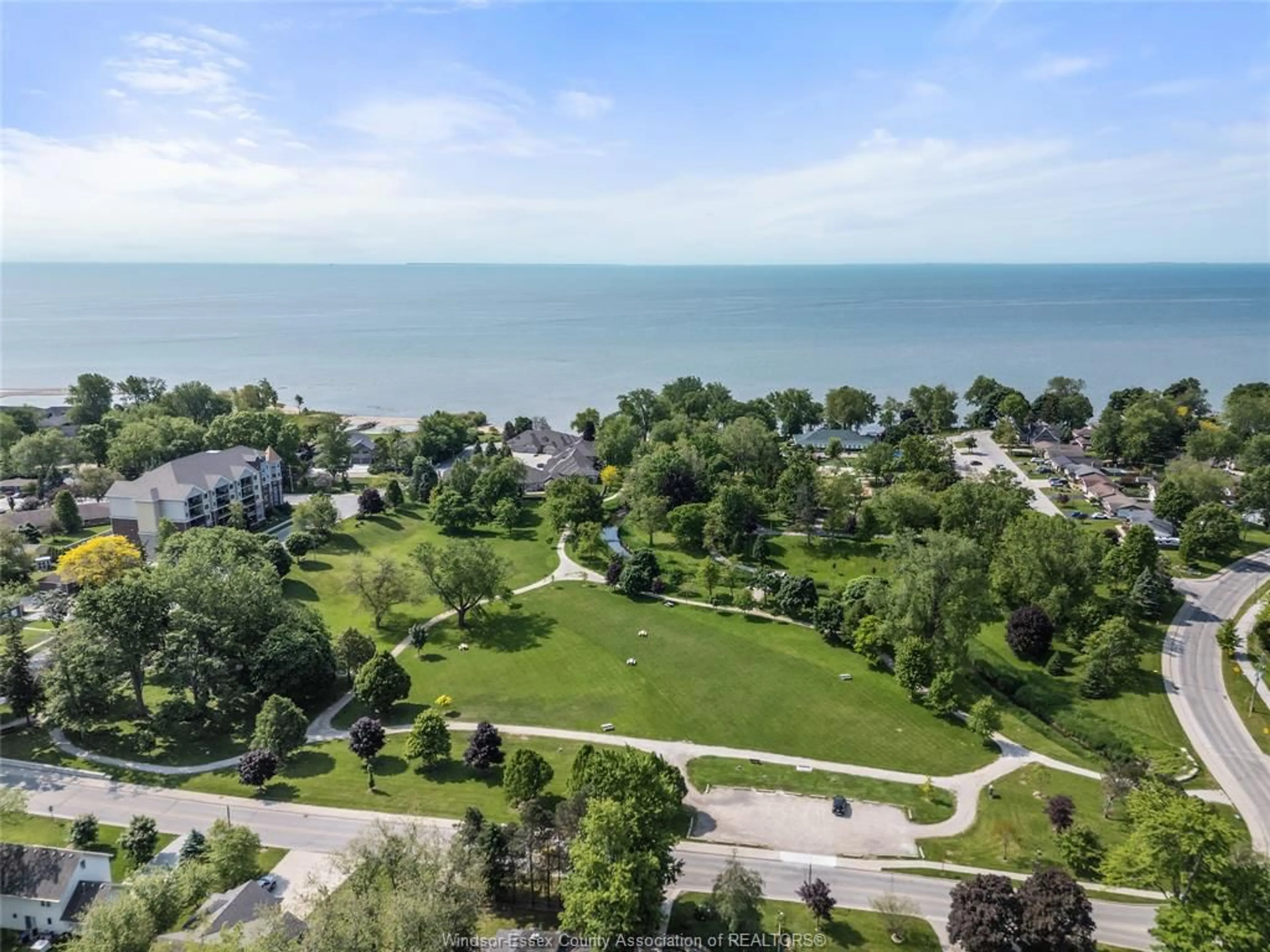 A pic from outside/outdoor area/front of a property/back of a property/a pic from drone, water/lake/river/ocean view for 12 LAKESIDE CR, Kingsville Ontario N9Y 4C1