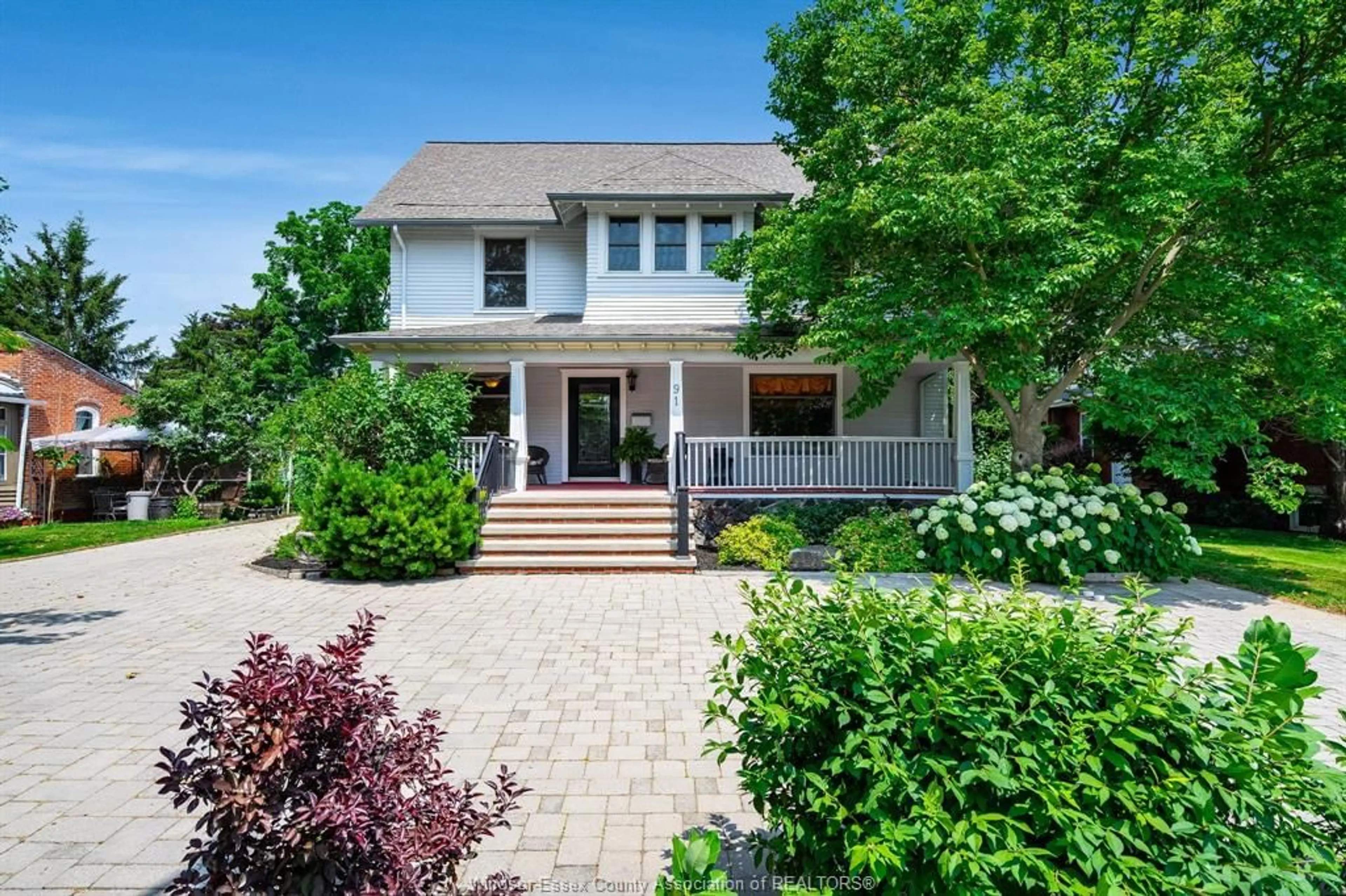 Home with brick exterior material, street for 91 Talbot St, Leamington Ontario N8H 1M7