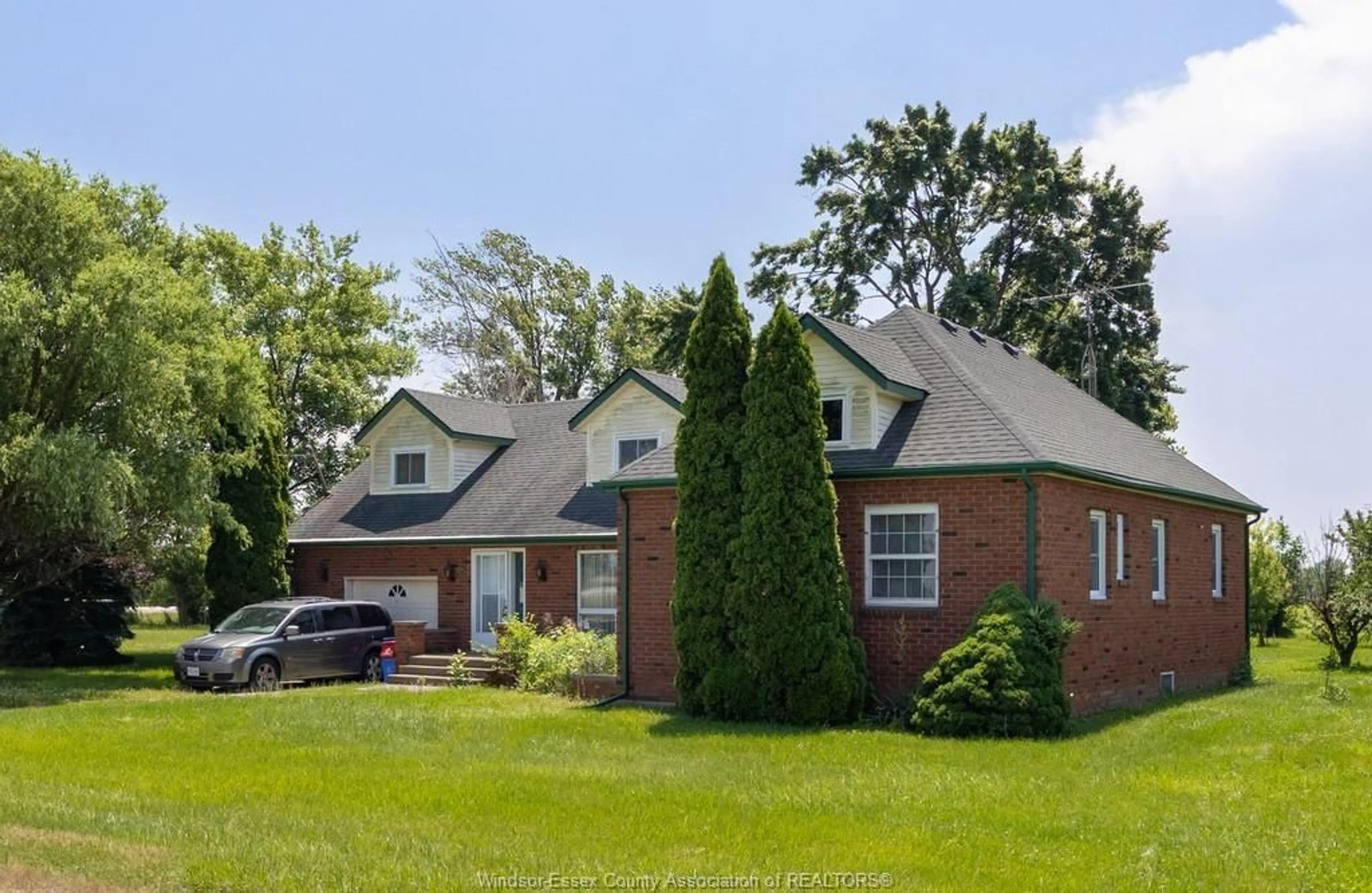 Home with brick exterior material, street for 9997 9TH CONCESSION Rd, Essex Ontario N8M 2X5