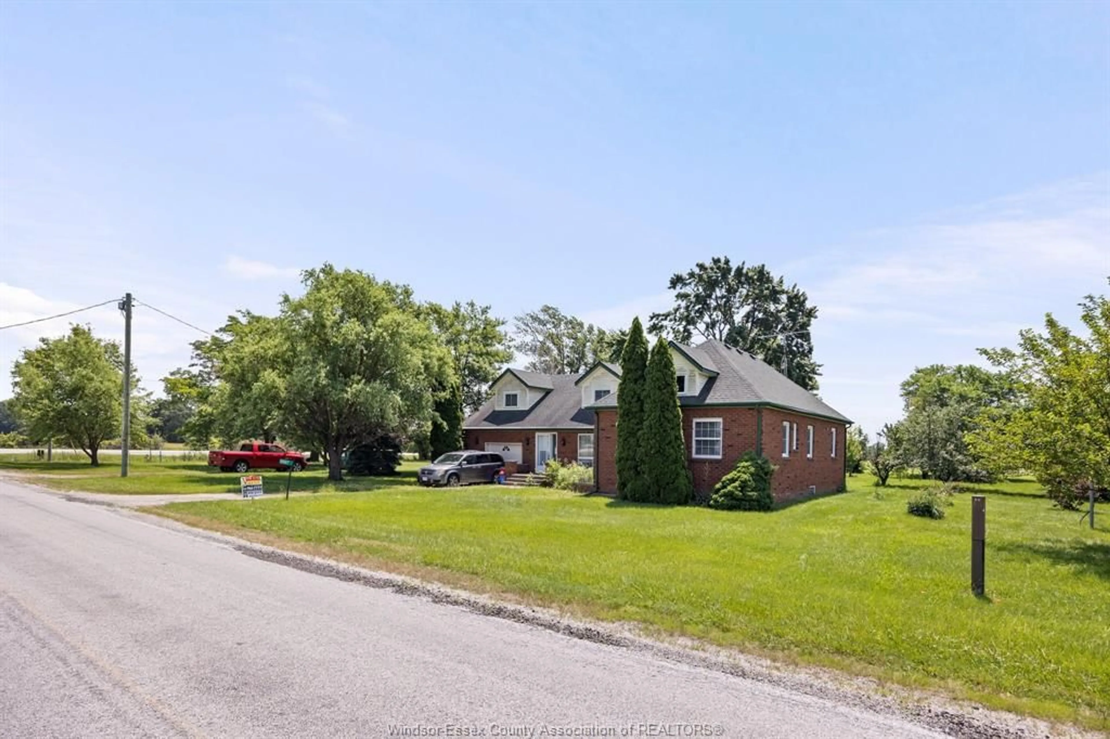 A pic from outside/outdoor area/front of a property/back of a property/a pic from drone, street for 9997 9TH CONCESSION Rd, Essex Ontario N8M 2X5