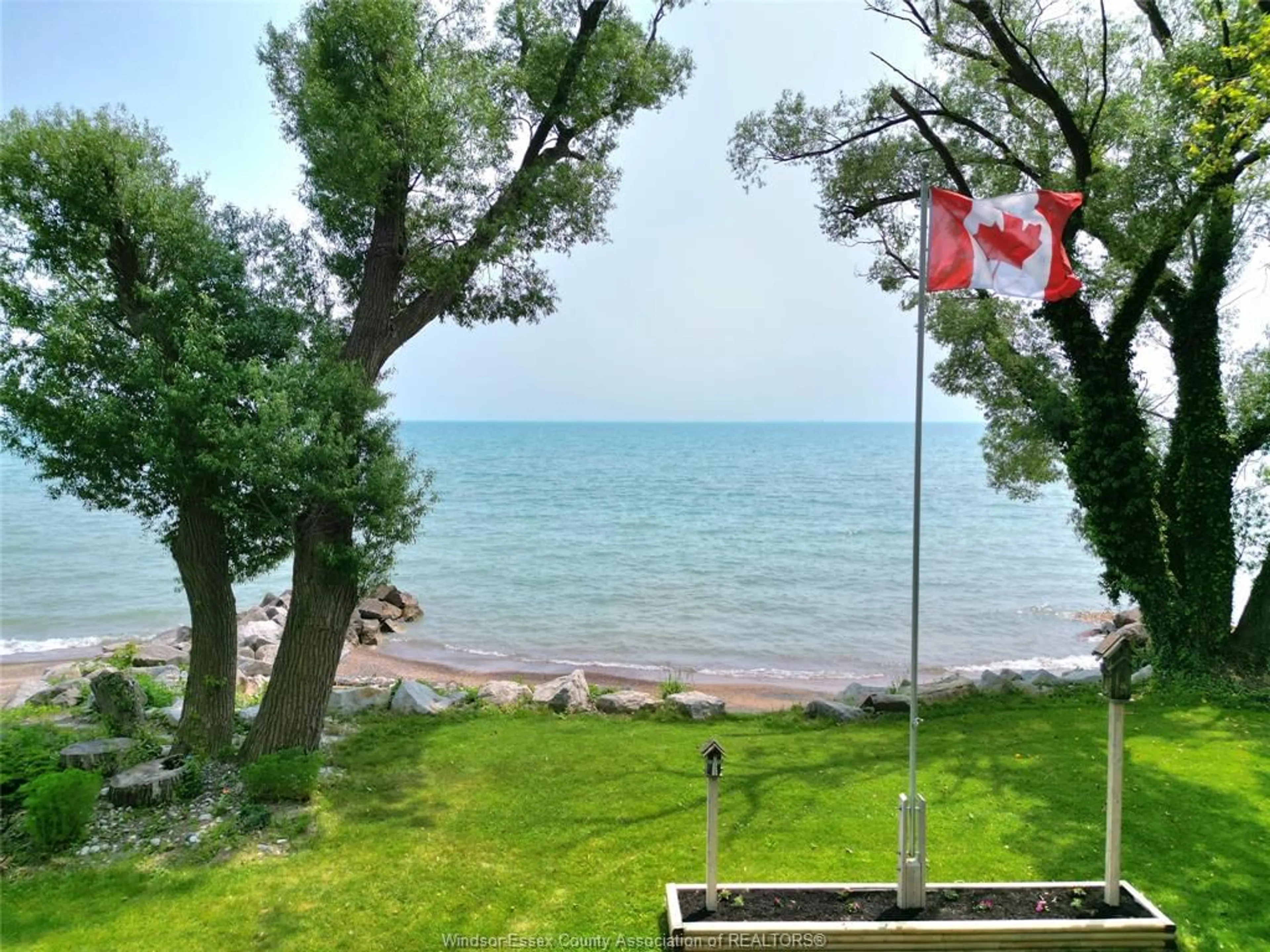 A pic from outside/outdoor area/front of a property/back of a property/a pic from drone, water/lake/river/ocean view for 1711 HERITAGE Rd, Kingsville Ontario N9Y 2E6