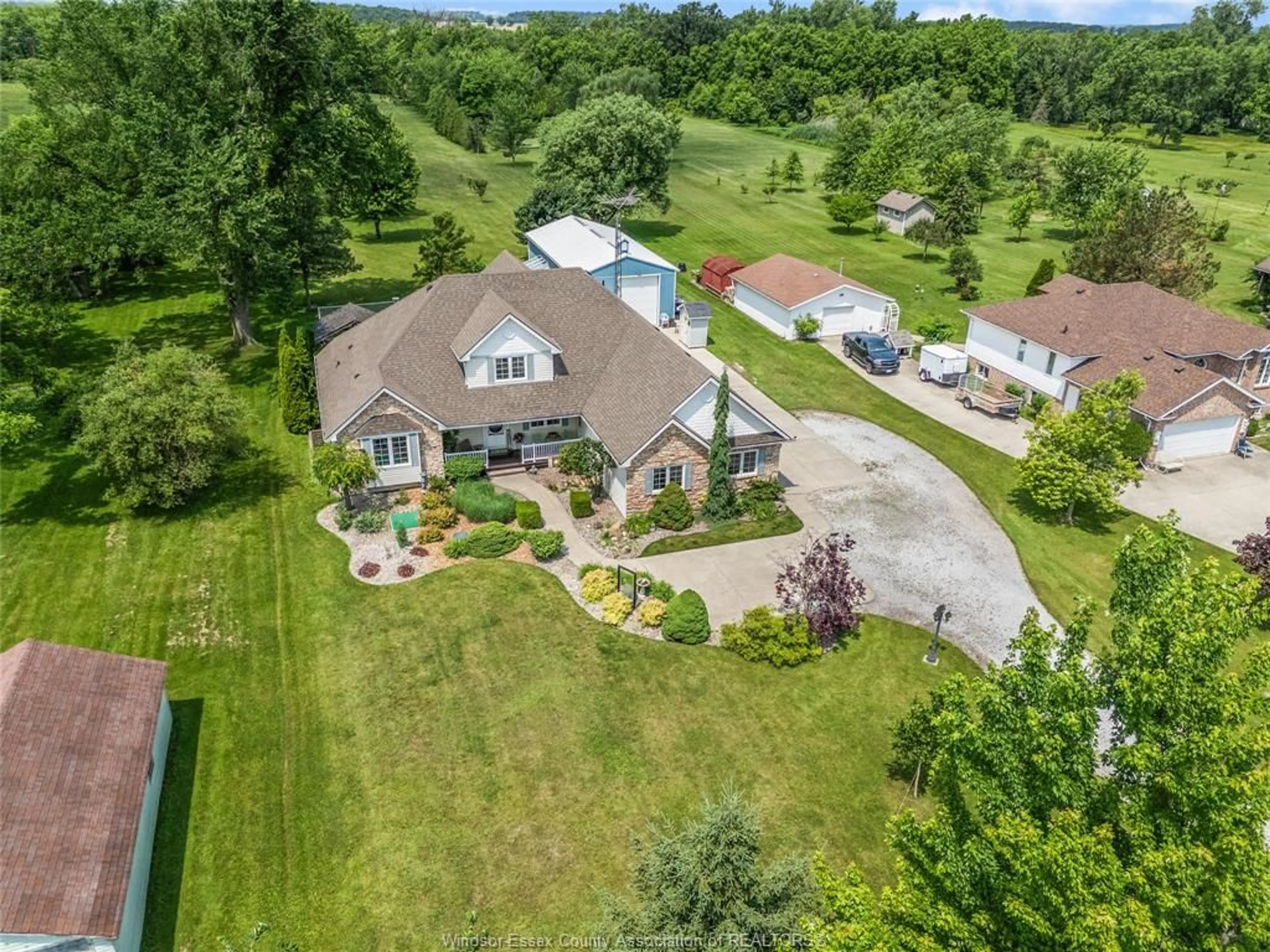 A pic from outside/outdoor area/front of a property/back of a property/a pic from drone, unknown for 2115 County Road 27, Lakeshore Ontario N0R 1V0