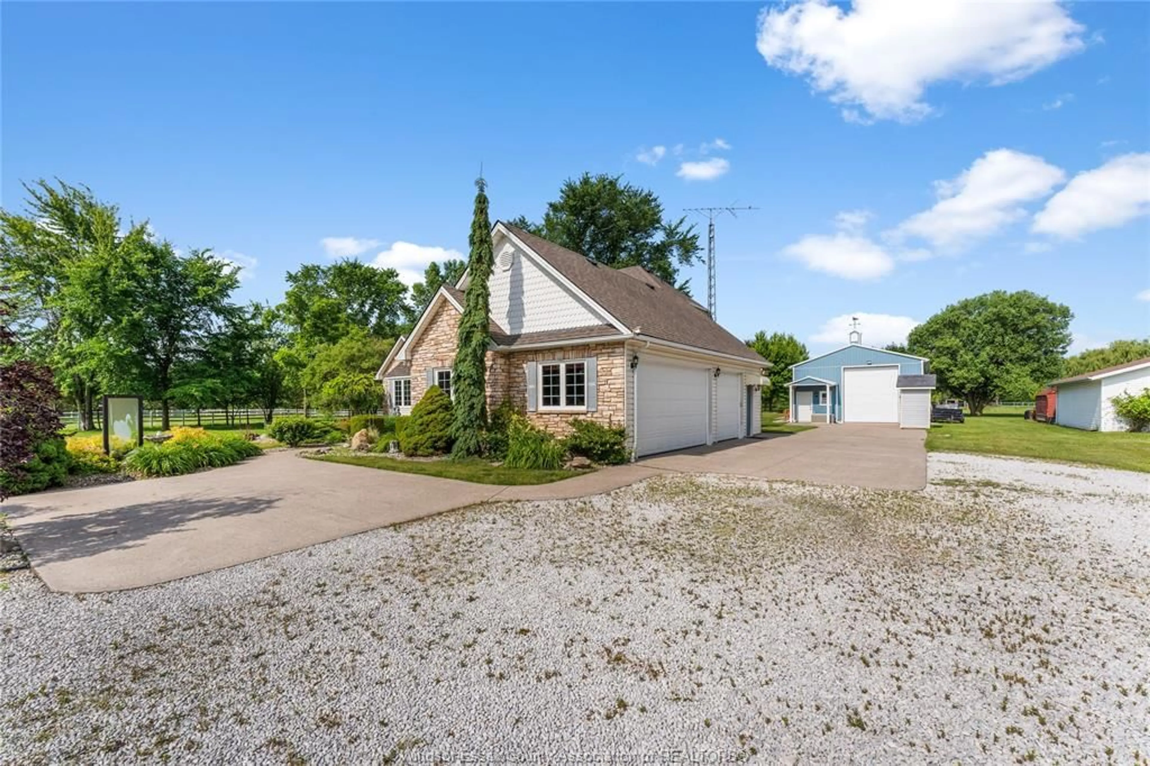 A pic from outside/outdoor area/front of a property/back of a property/a pic from drone, street for 2115 County Road 27, Lakeshore Ontario N0R 1V0
