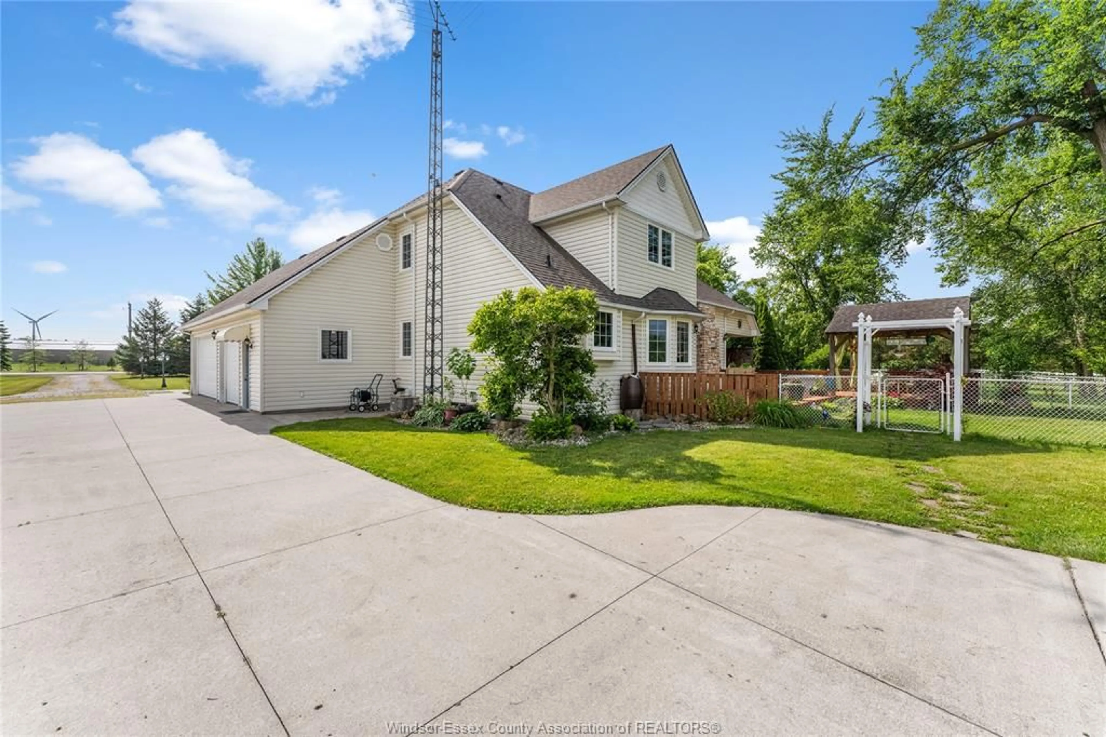 A pic from outside/outdoor area/front of a property/back of a property/a pic from drone, street for 2115 County Road 27, Lakeshore Ontario N0R 1V0