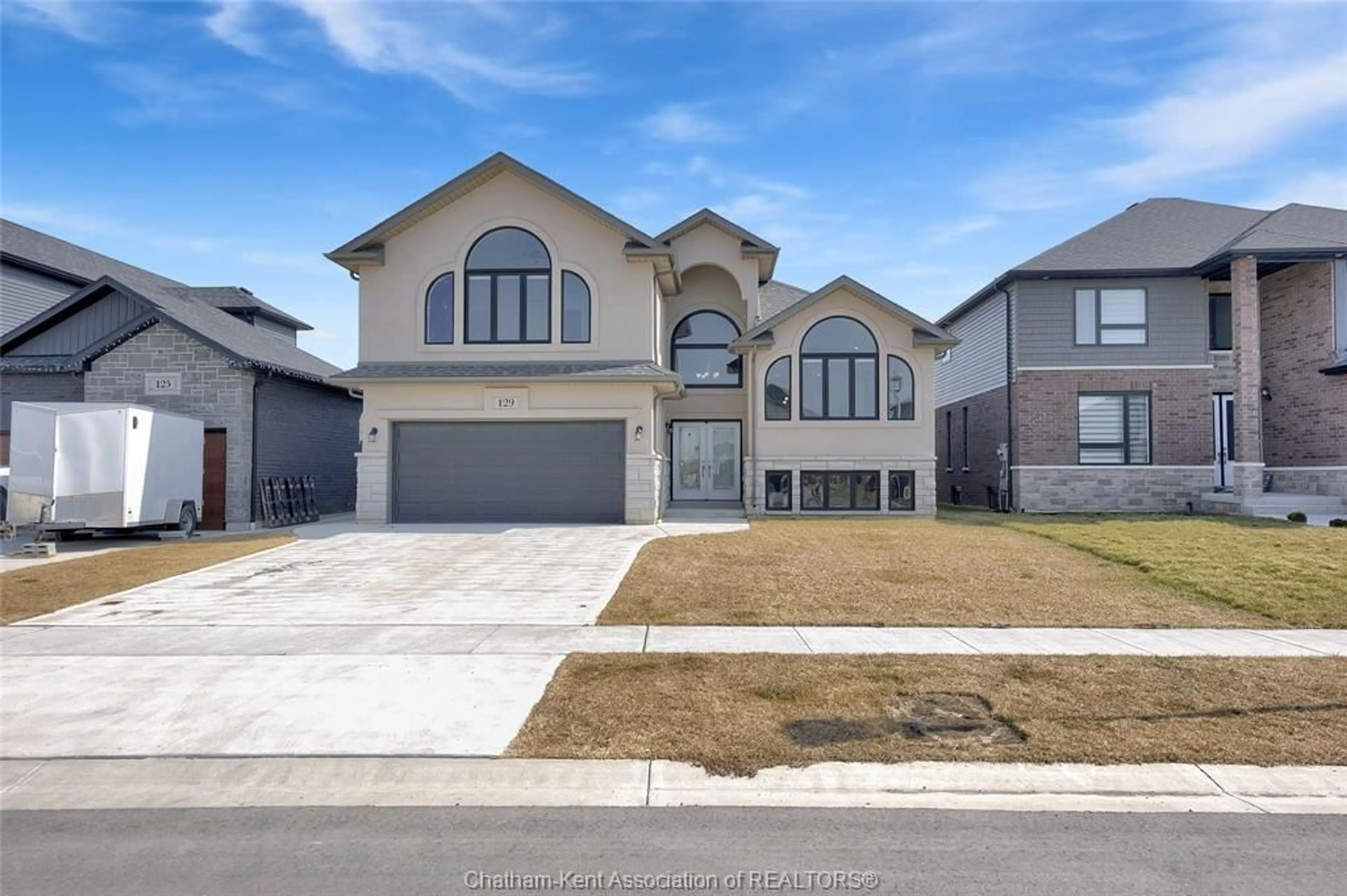 Home with brick exterior material, street for 129 TUSCANY Trail, Chatham Ontario N7M 0R9
